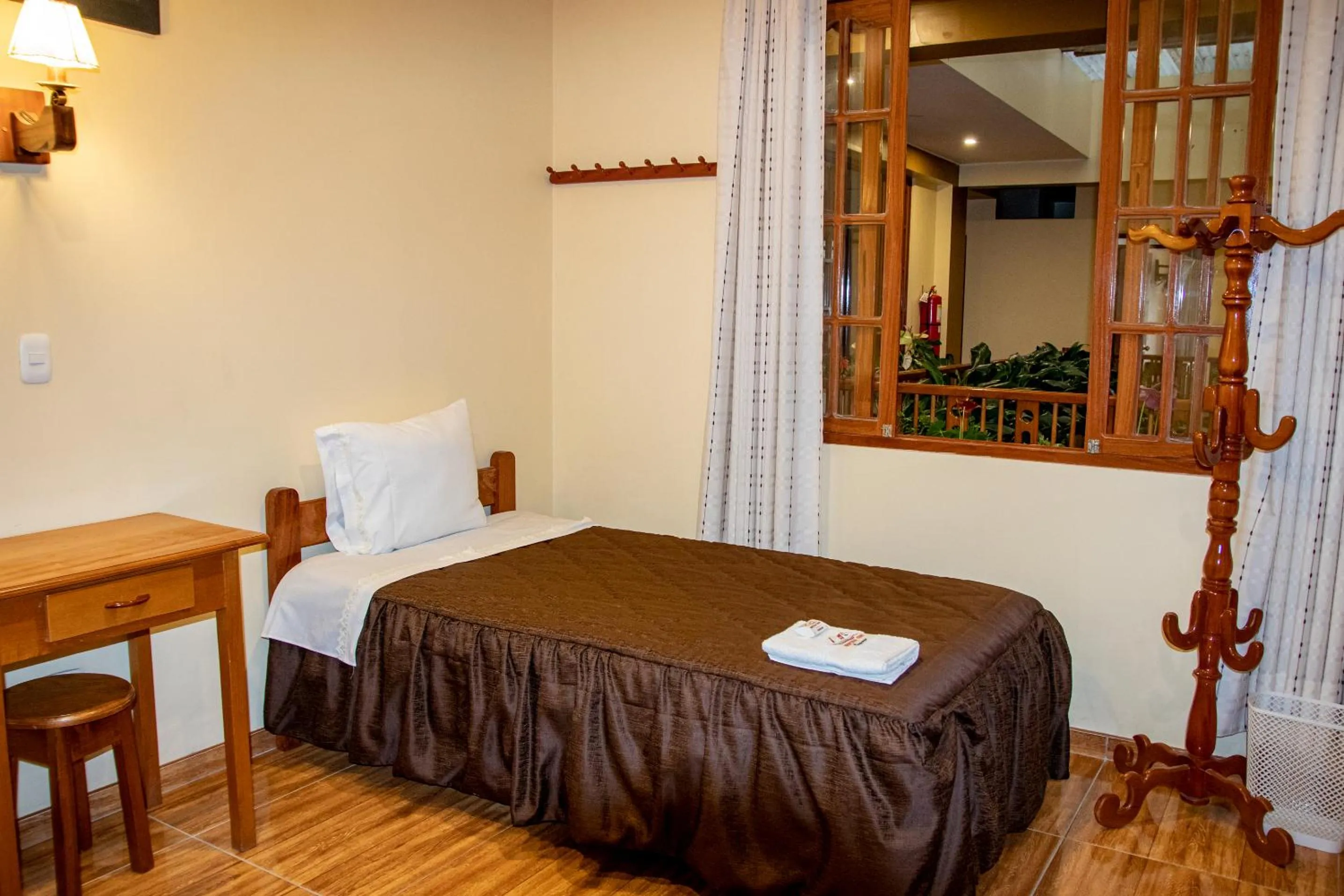 Bed in Hospedaje Chimy