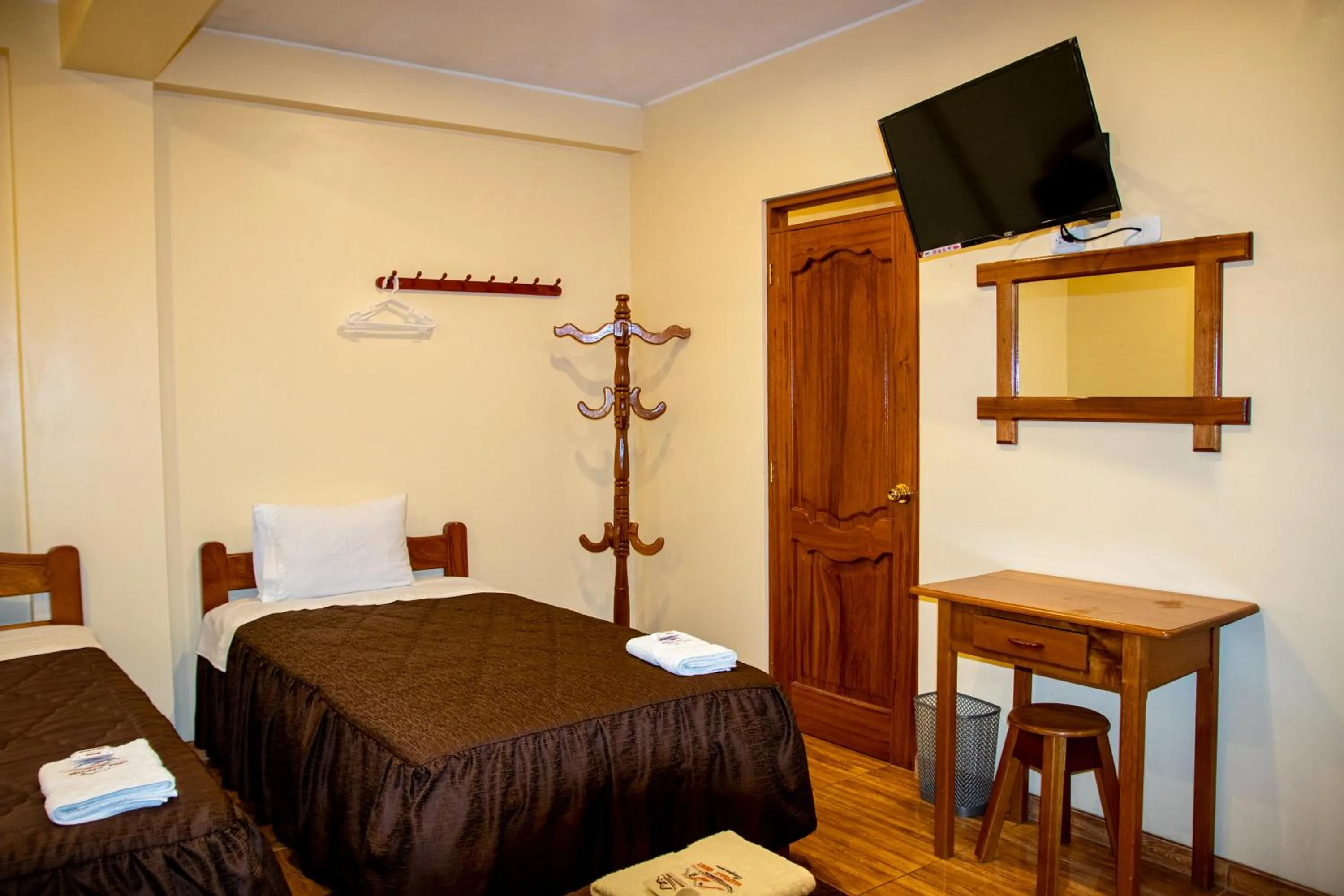Bed in Hospedaje Chimy