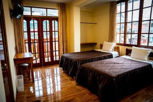 Bed in Hospedaje Chimy