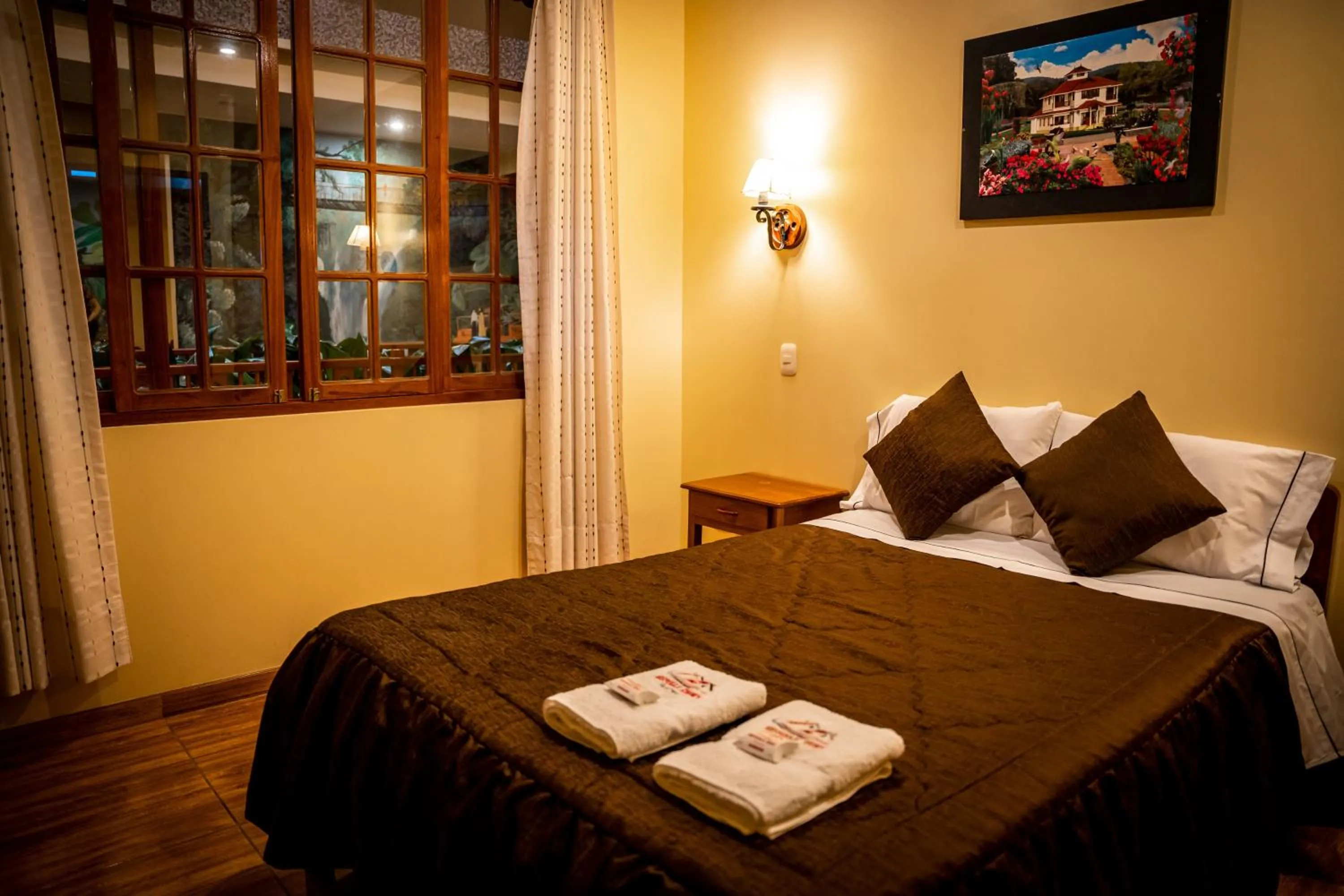Bed in Hospedaje Chimy