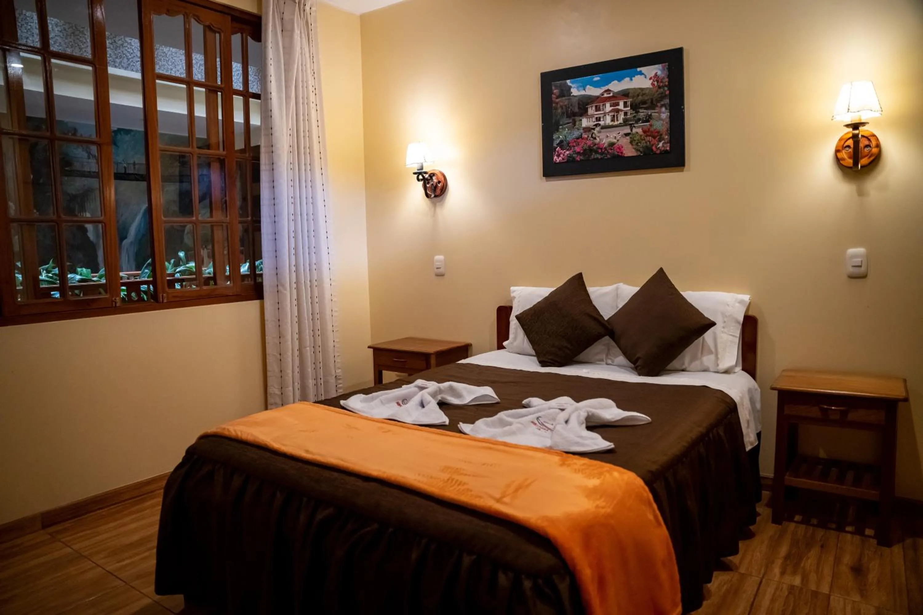 Bed in Hospedaje Chimy