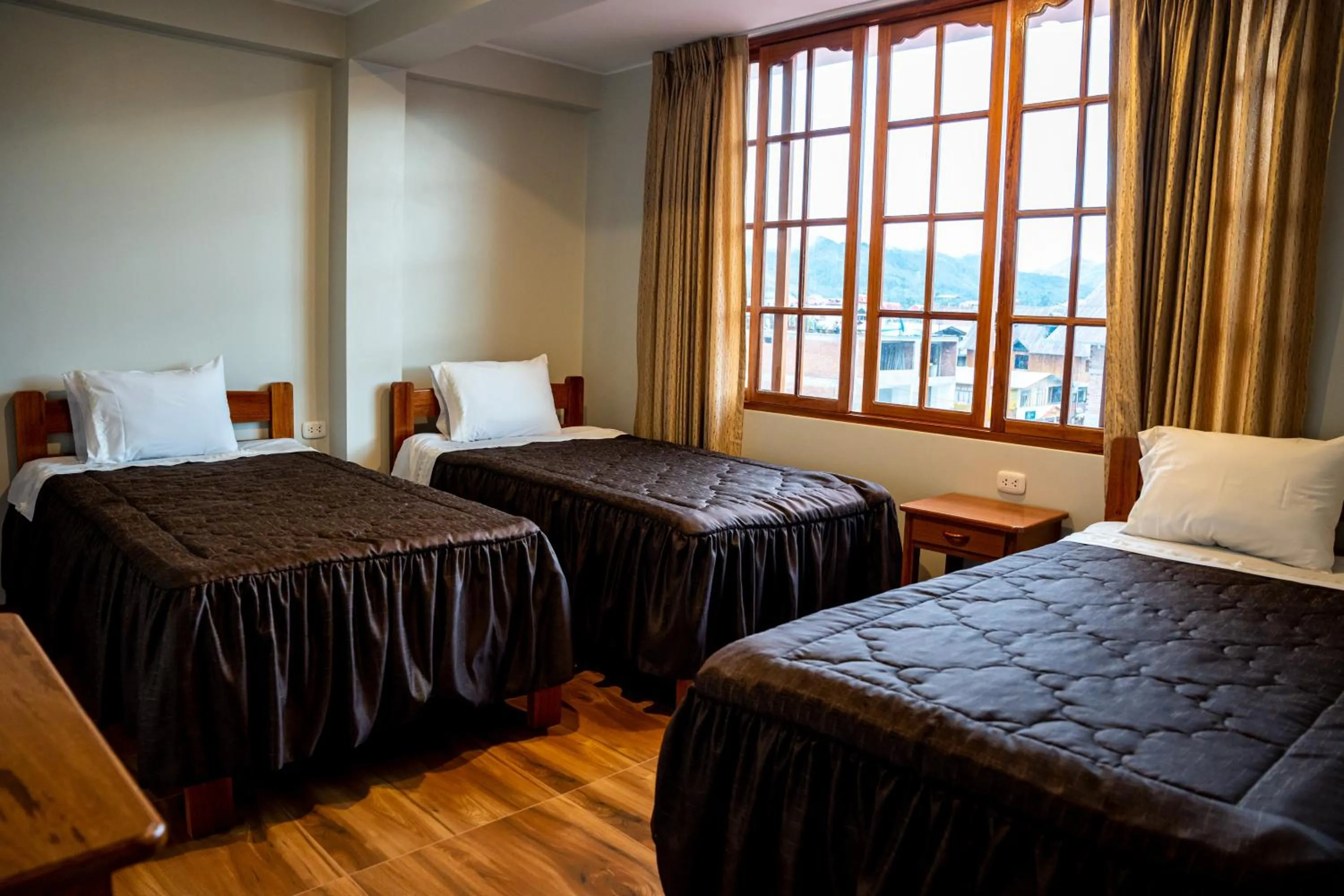 Bed in Hospedaje Chimy