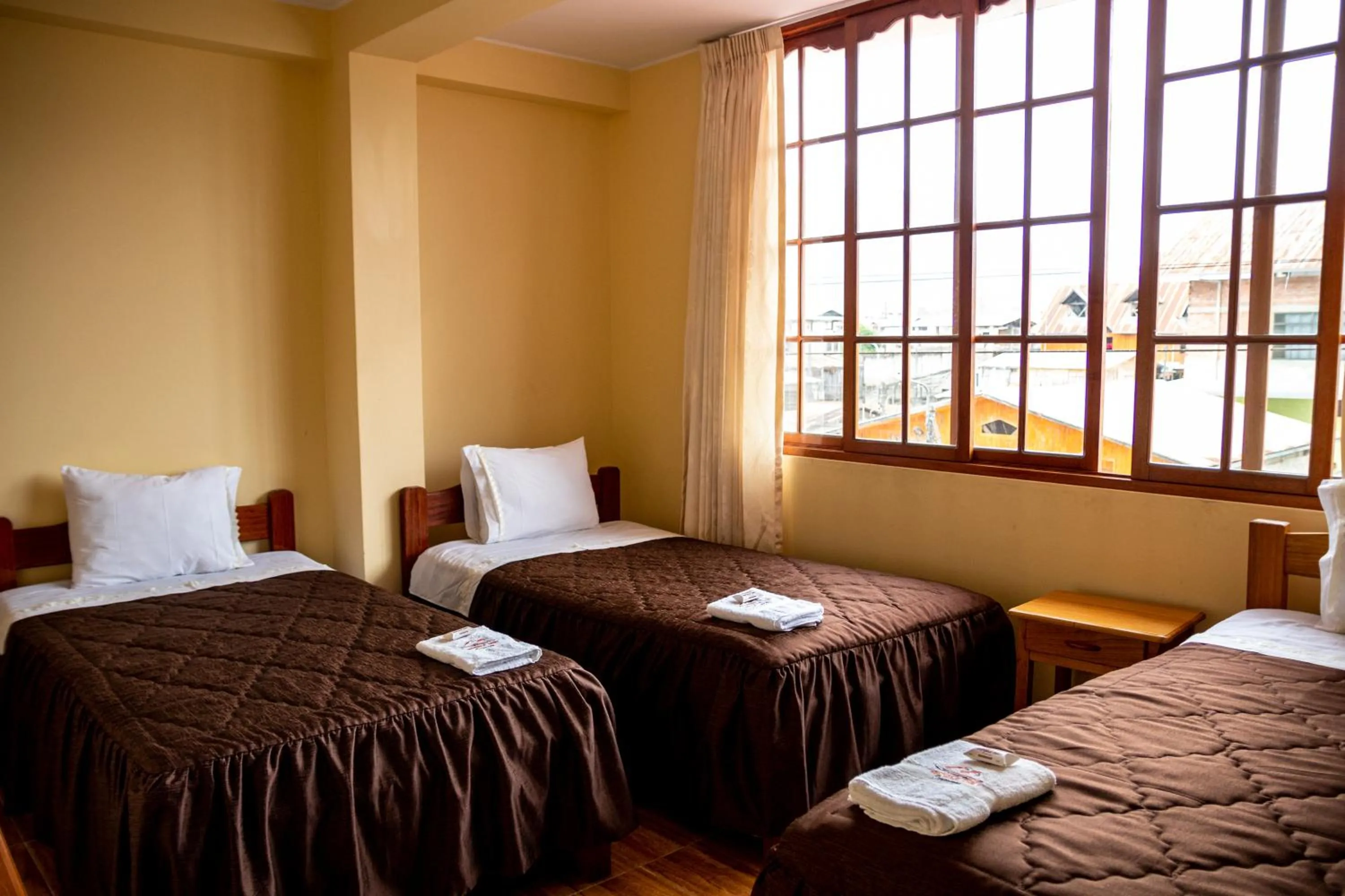 Bed in Hospedaje Chimy