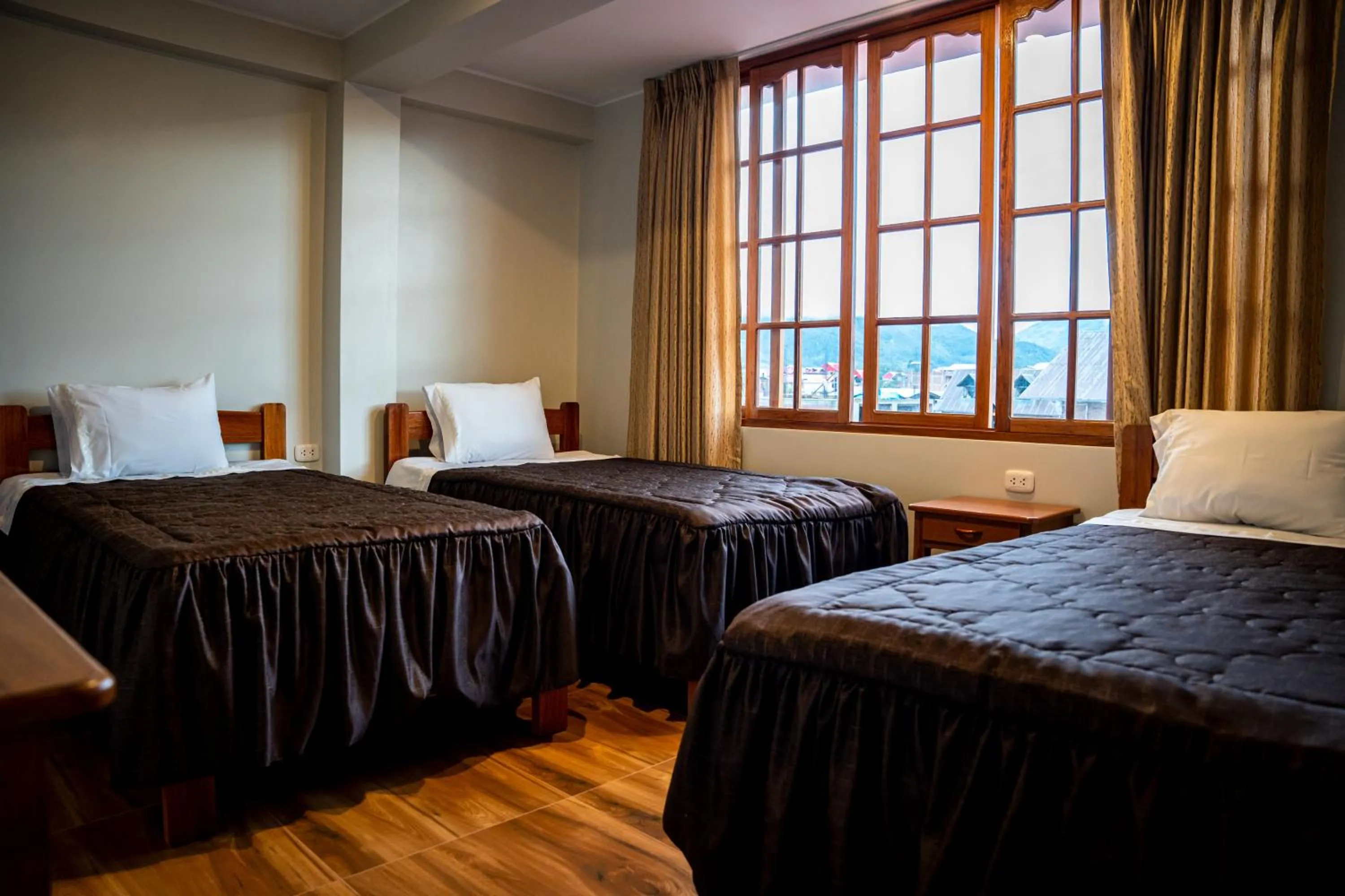 Bed in Hospedaje Chimy