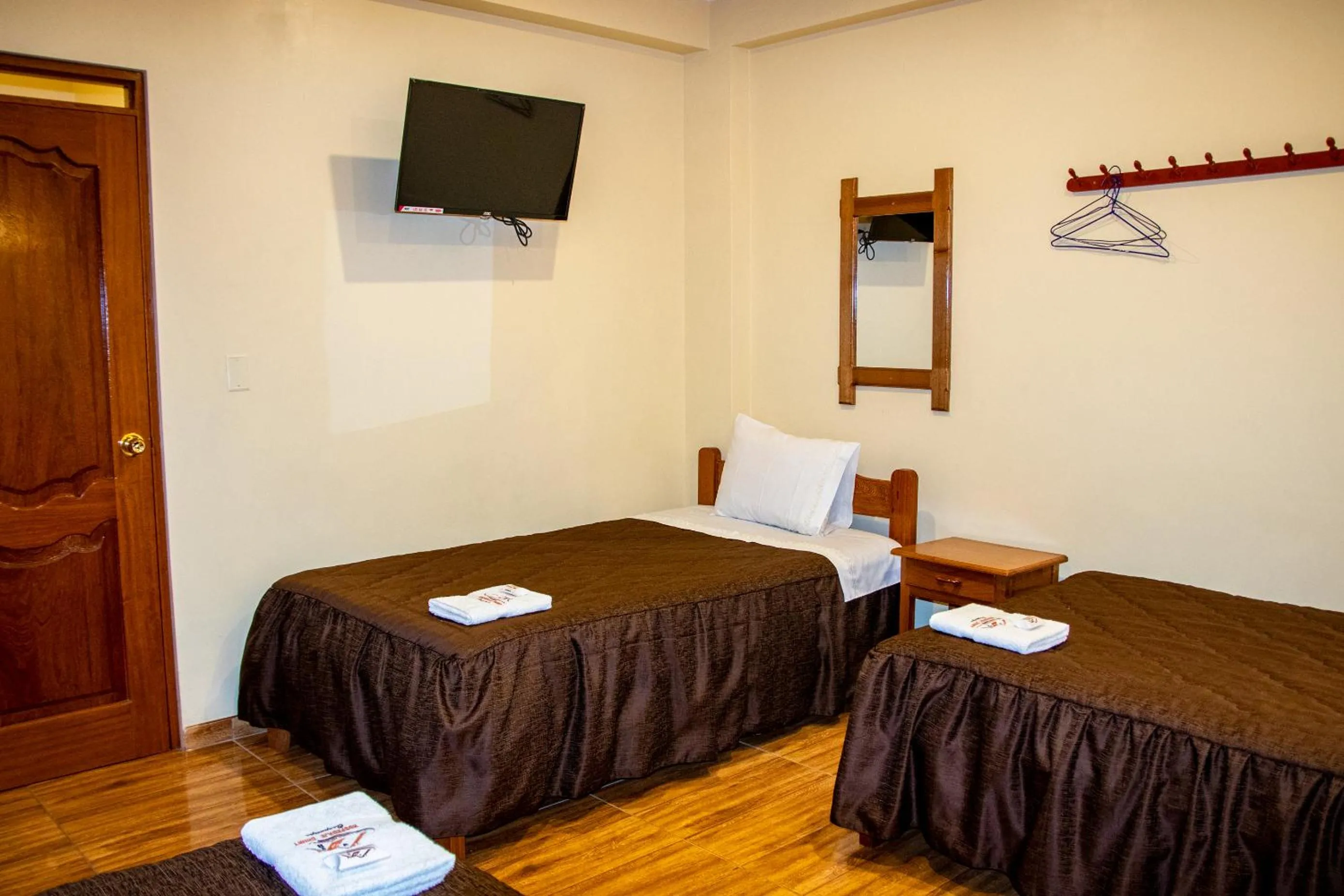 Bed in Hospedaje Chimy