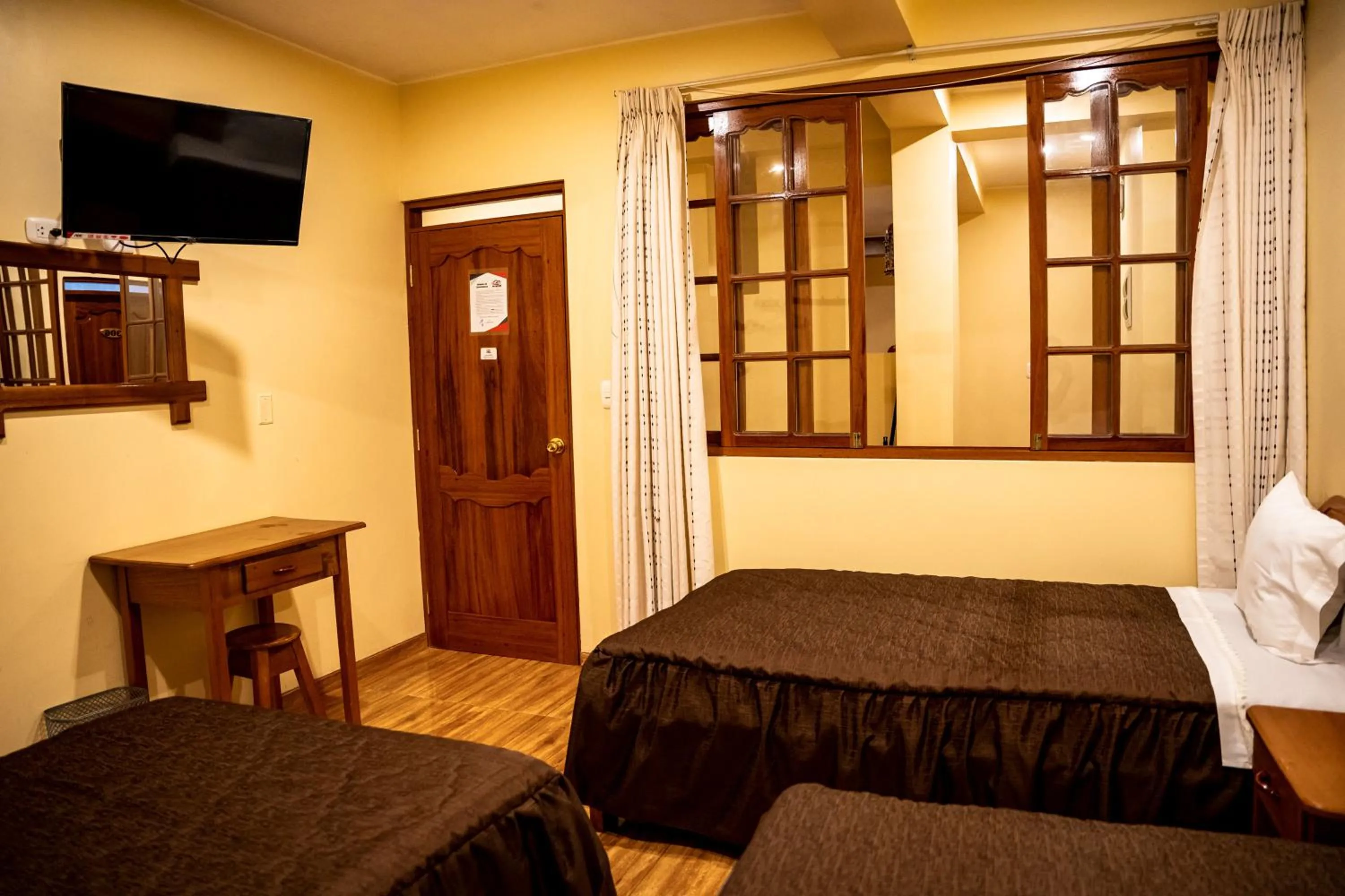 Bed in Hospedaje Chimy