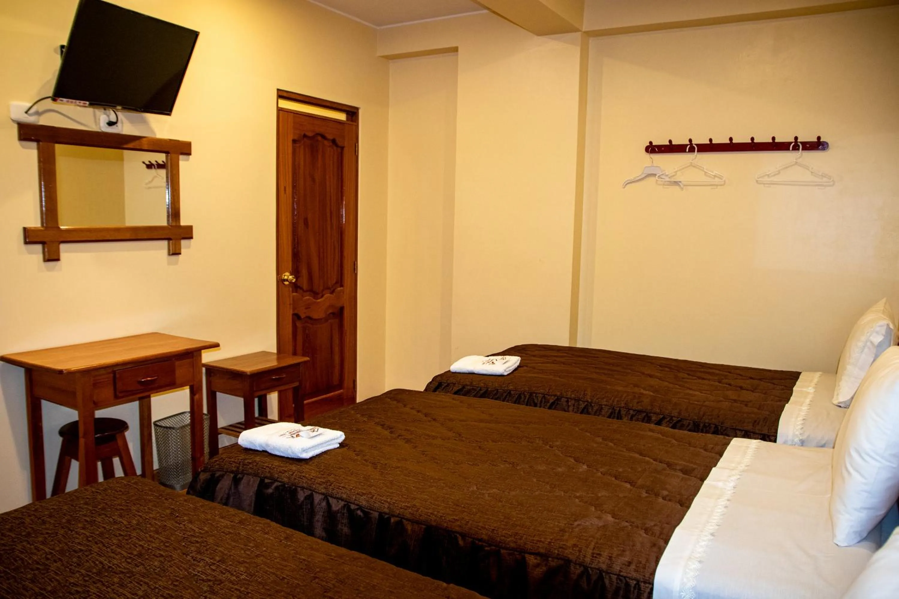 Bed in Hospedaje Chimy