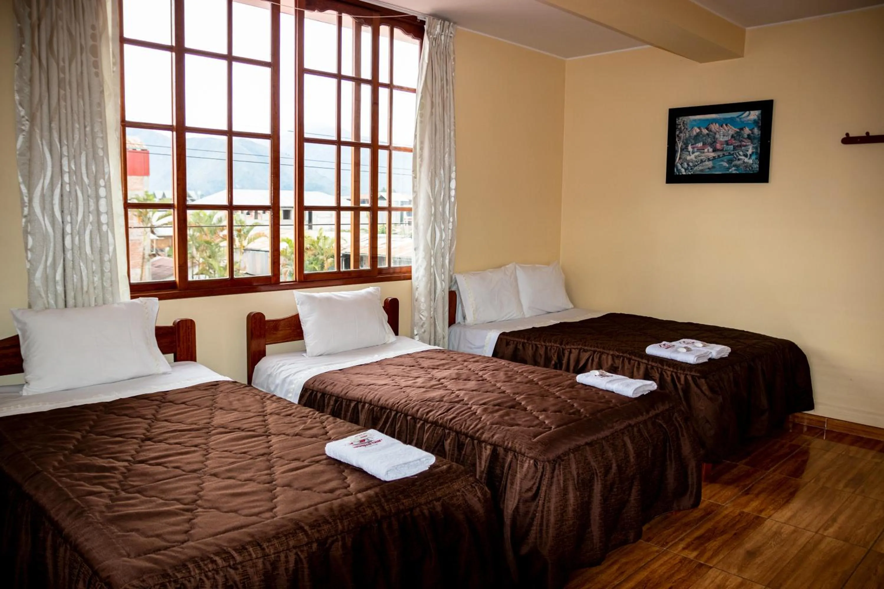 Bed in Hospedaje Chimy