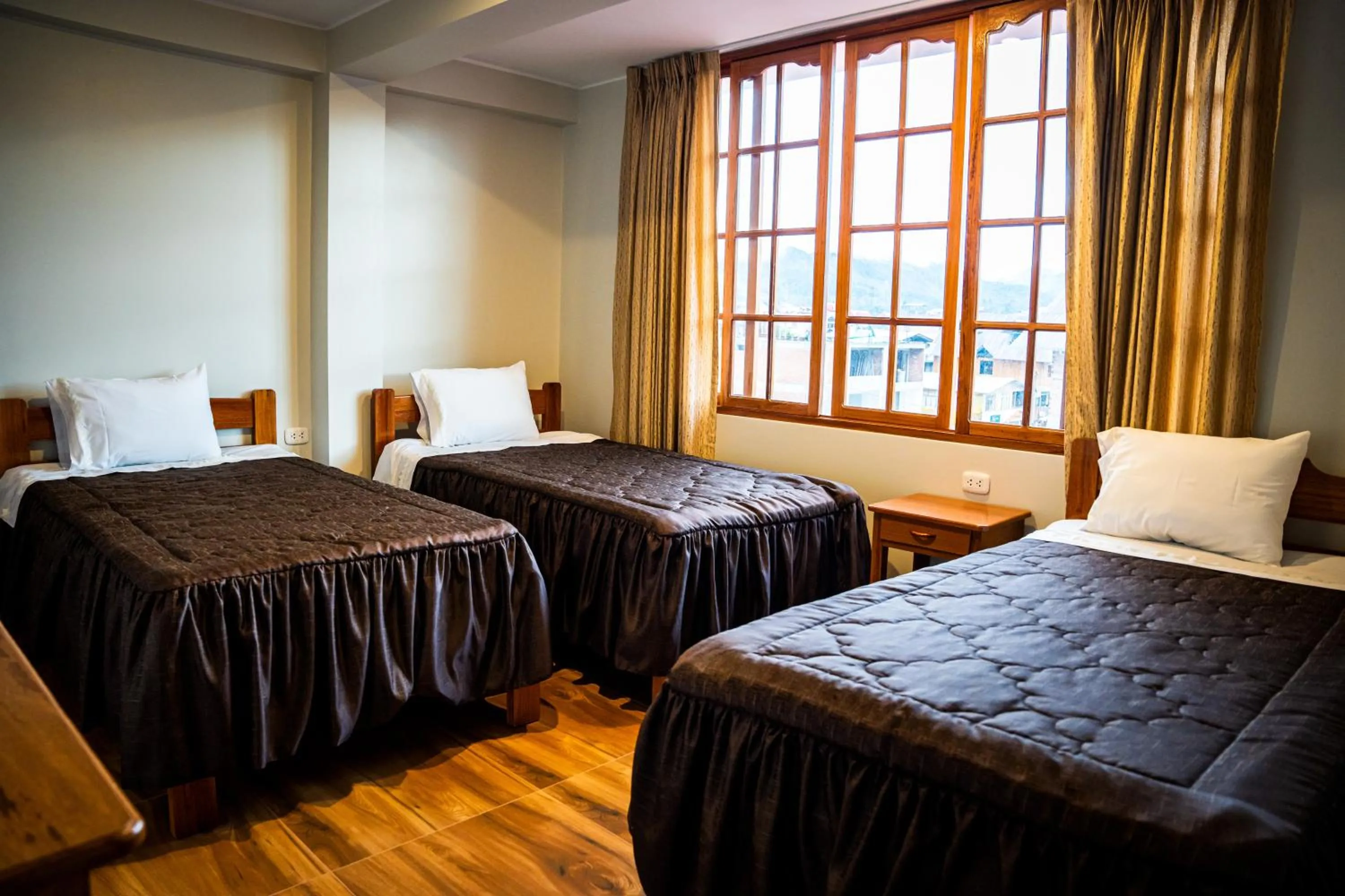Bed in Hospedaje Chimy