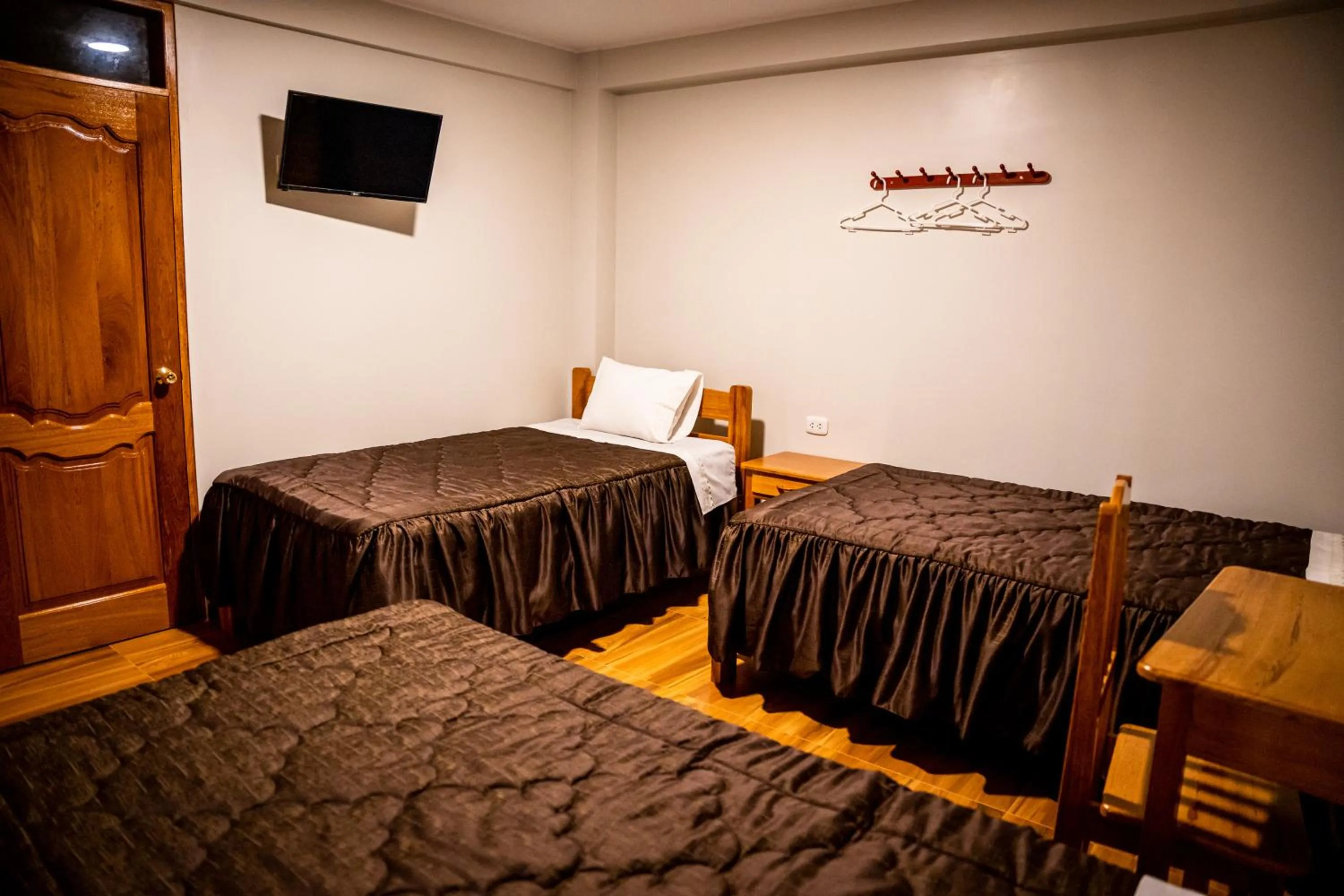 Bed in Hospedaje Chimy
