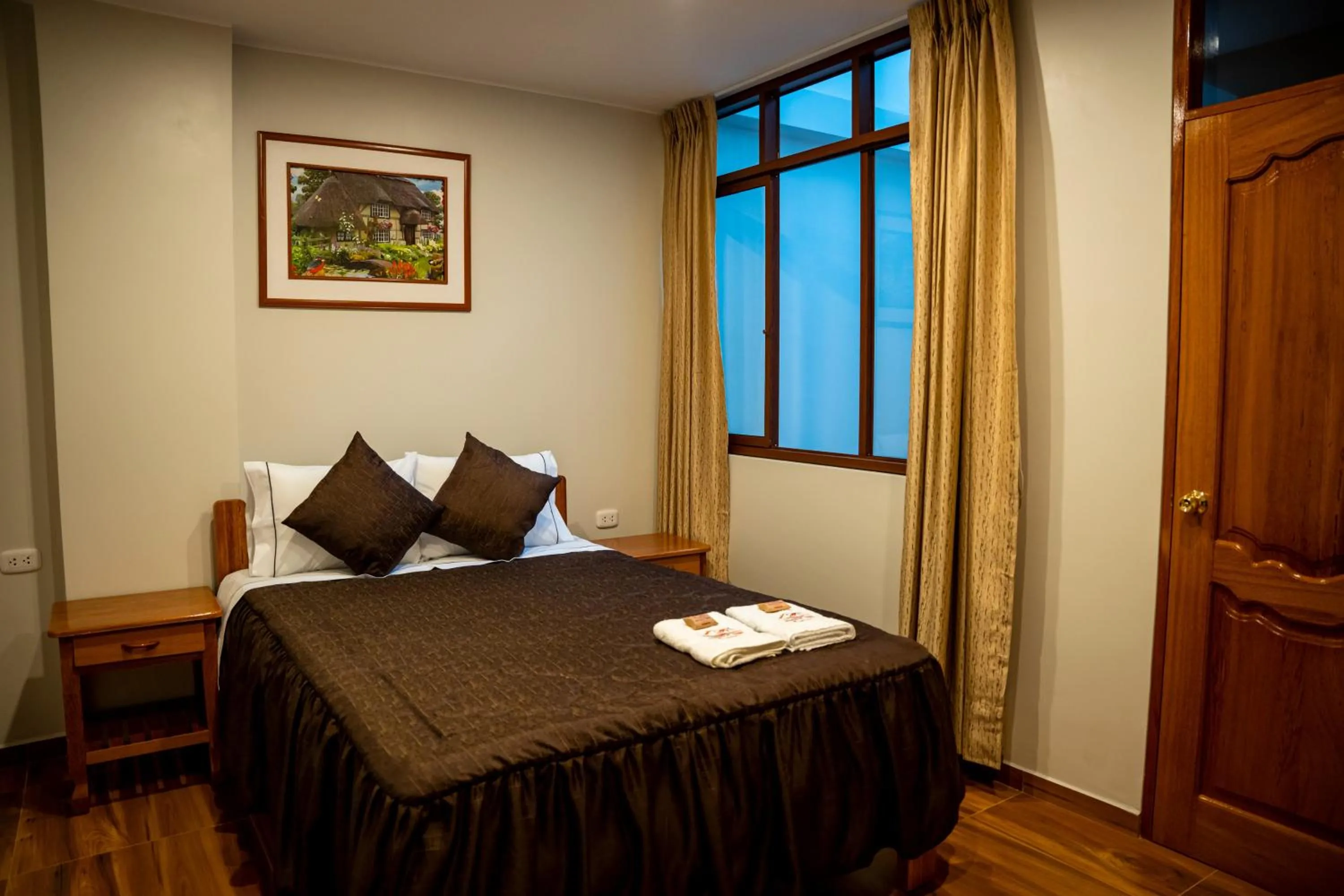 Bed in Hospedaje Chimy