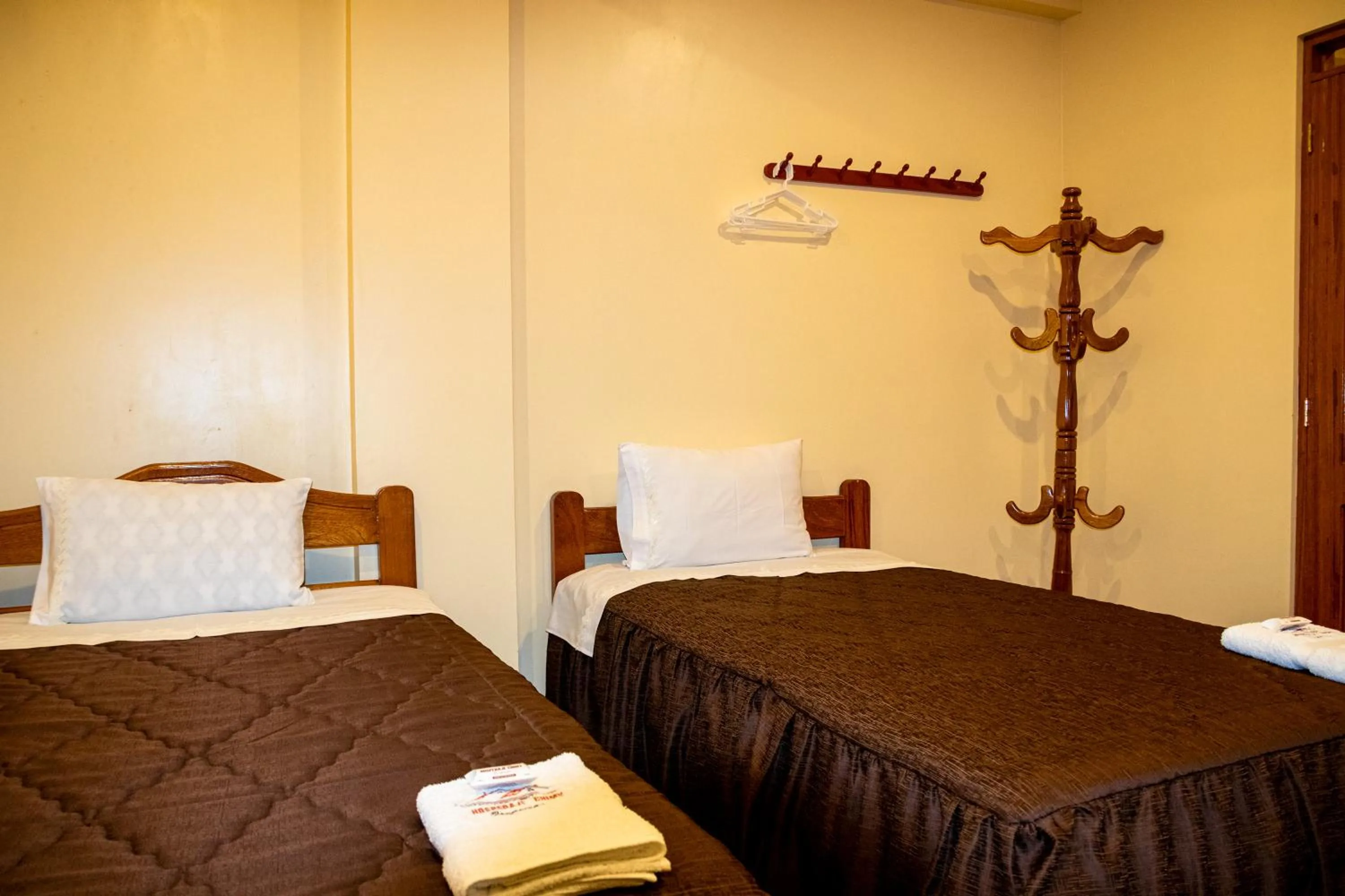 Bed in Hospedaje Chimy