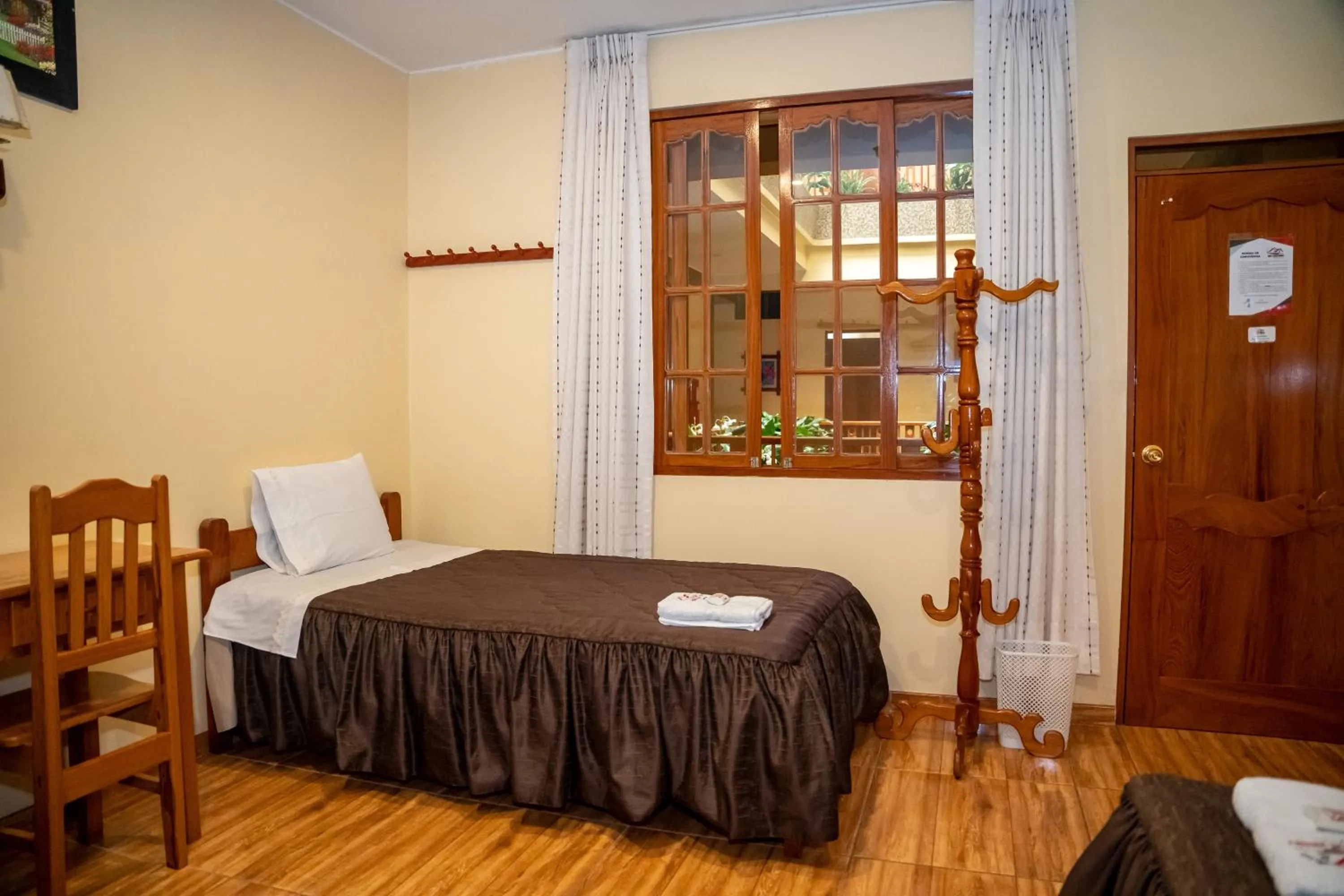 Bed in Hospedaje Chimy