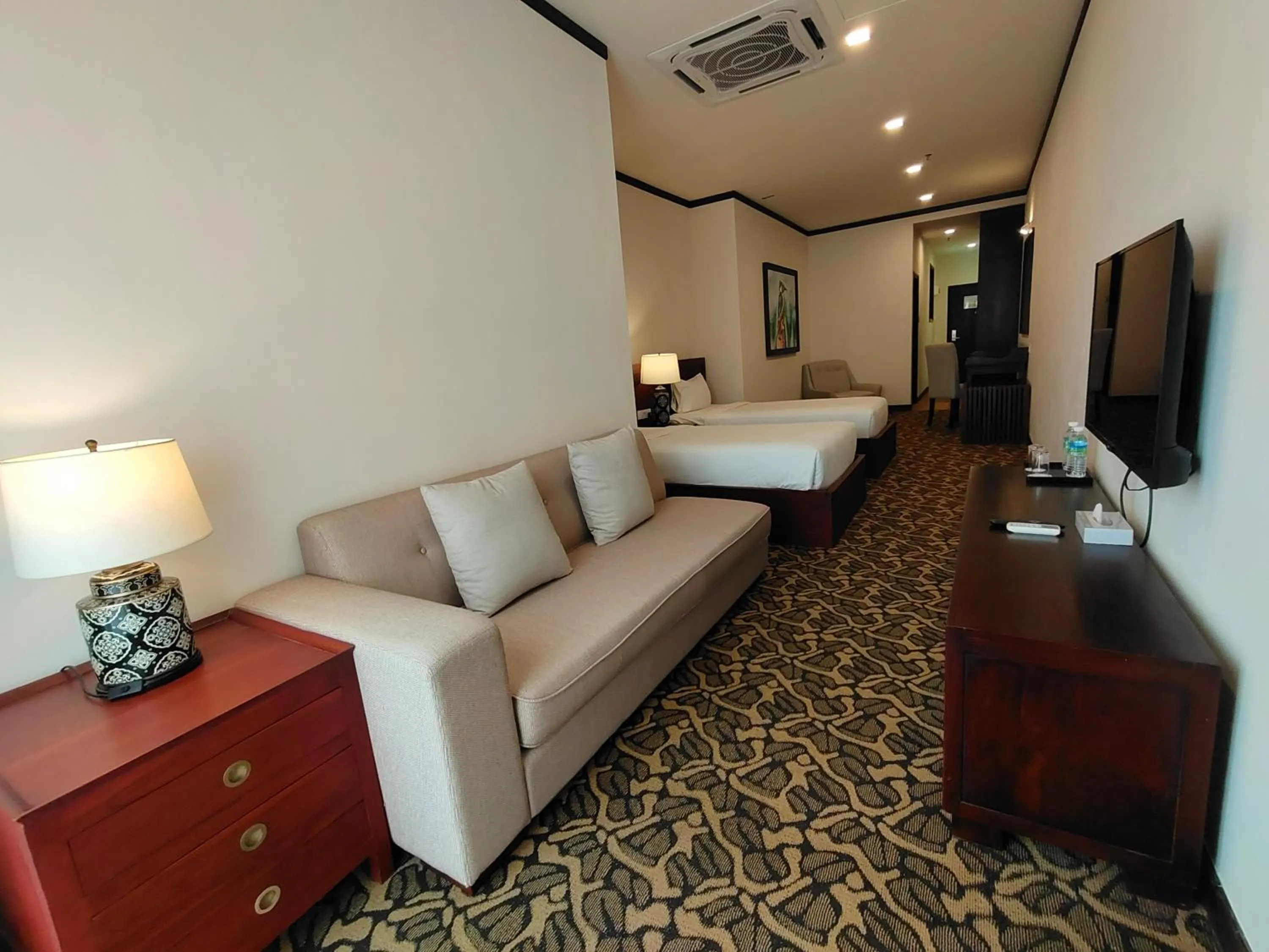 Seating area, Bed in Riviera Suites Melaka