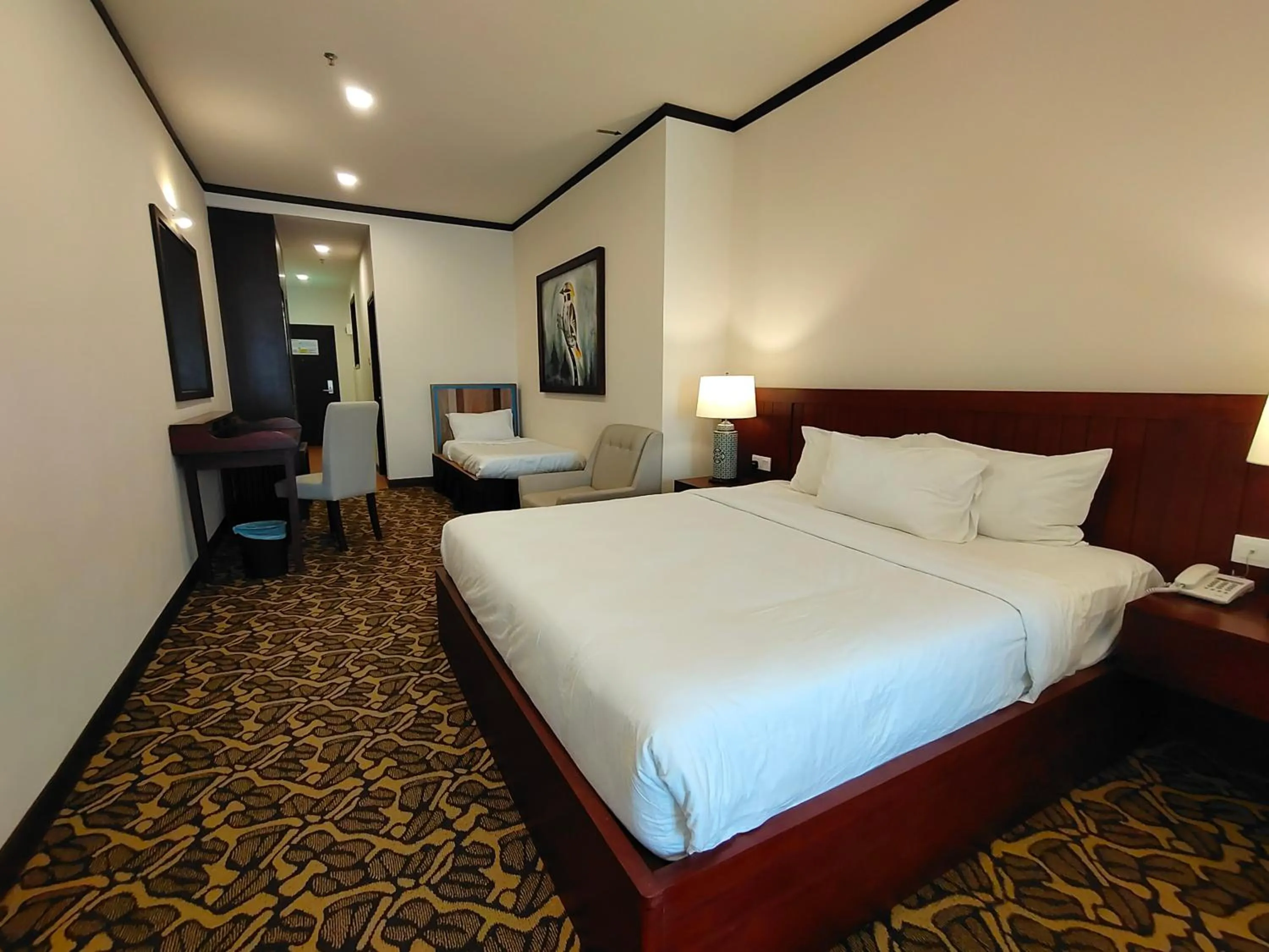 Bed in Riviera Suites Melaka