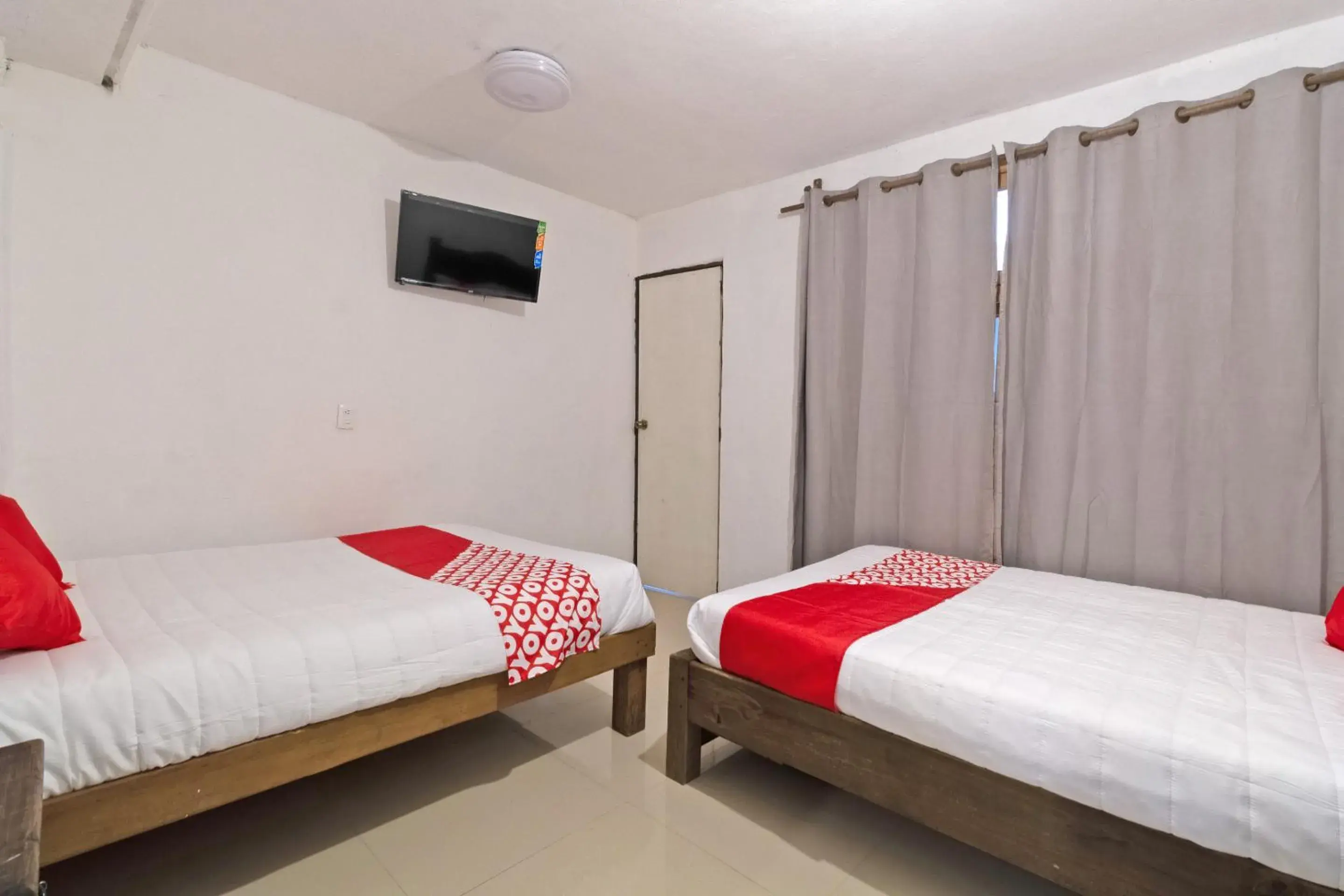 Bedroom, Bed in OYO Hotel Punta Guadalupe, San Cristóbal de las Casas Bedroom, Bed in OYO Hotel Punta Guadalupe, San Cristóbal de las Casas