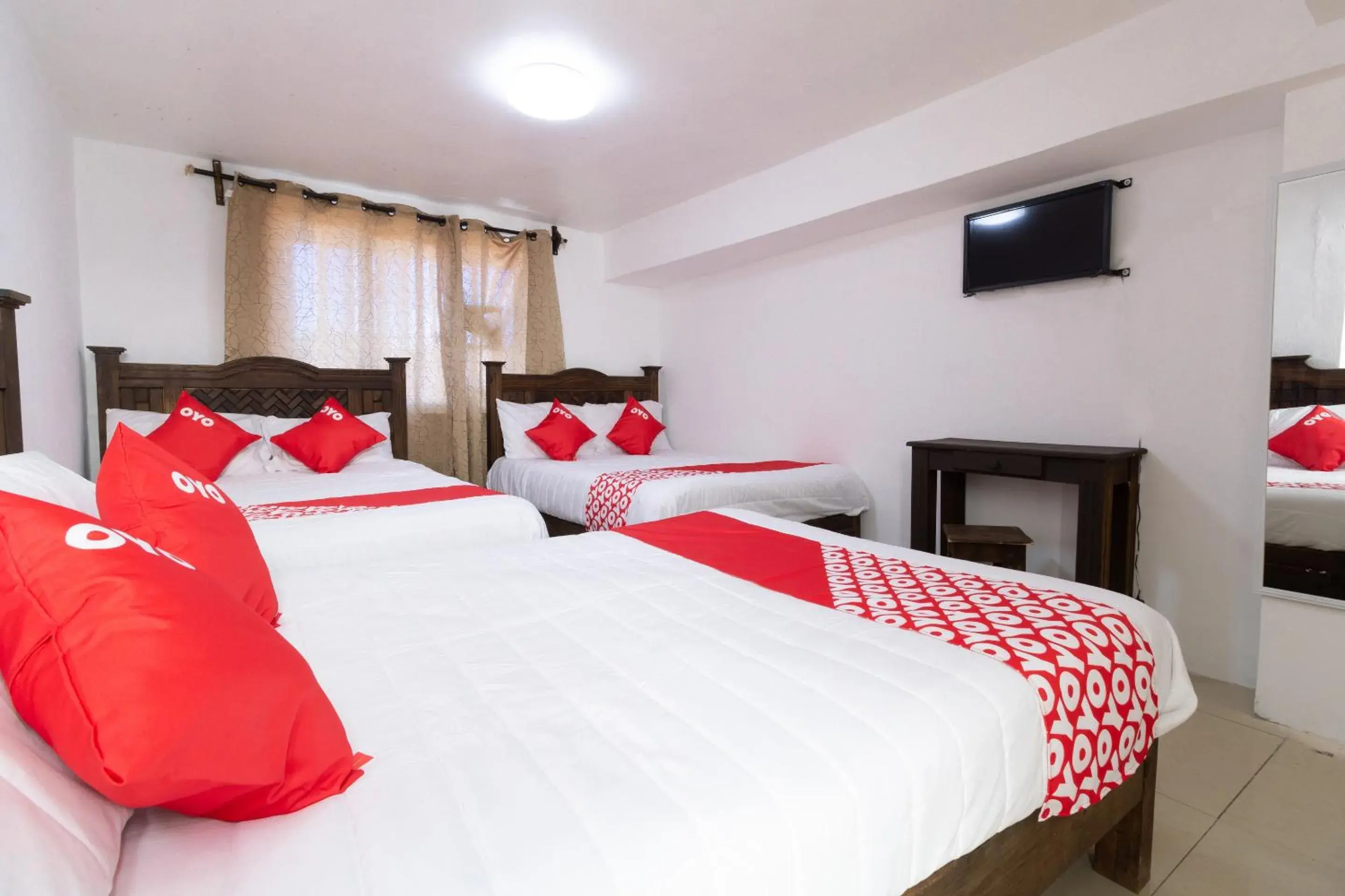 Bedroom, Bed in OYO Hotel Punta Guadalupe, San Cristóbal de las Casas Bedroom, Bed in OYO Hotel Punta Guadalupe, San Cristóbal de las Casas