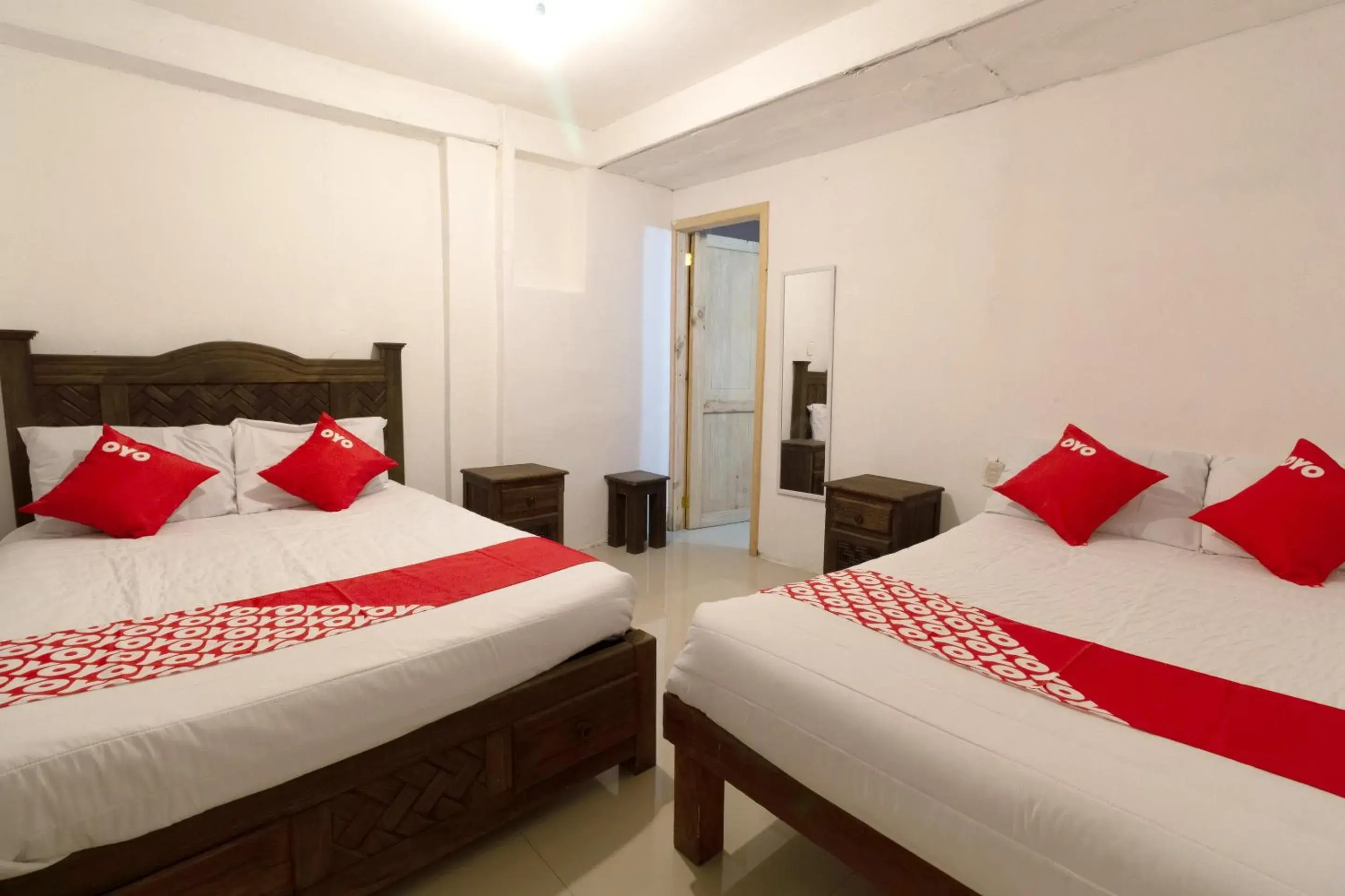 Bedroom, Bed in OYO Hotel Punta Guadalupe, San Cristóbal de las Casas Bedroom, Bed in OYO Hotel Punta Guadalupe, San Cristóbal de las Casas