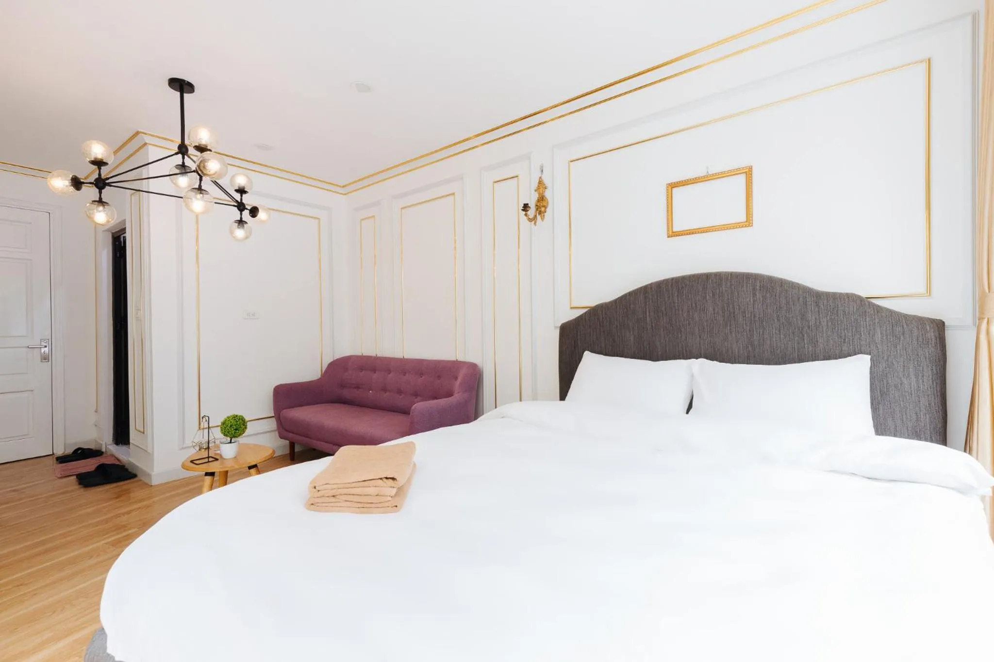 Bed in SaziHome Le Thanh Tong Hanoi