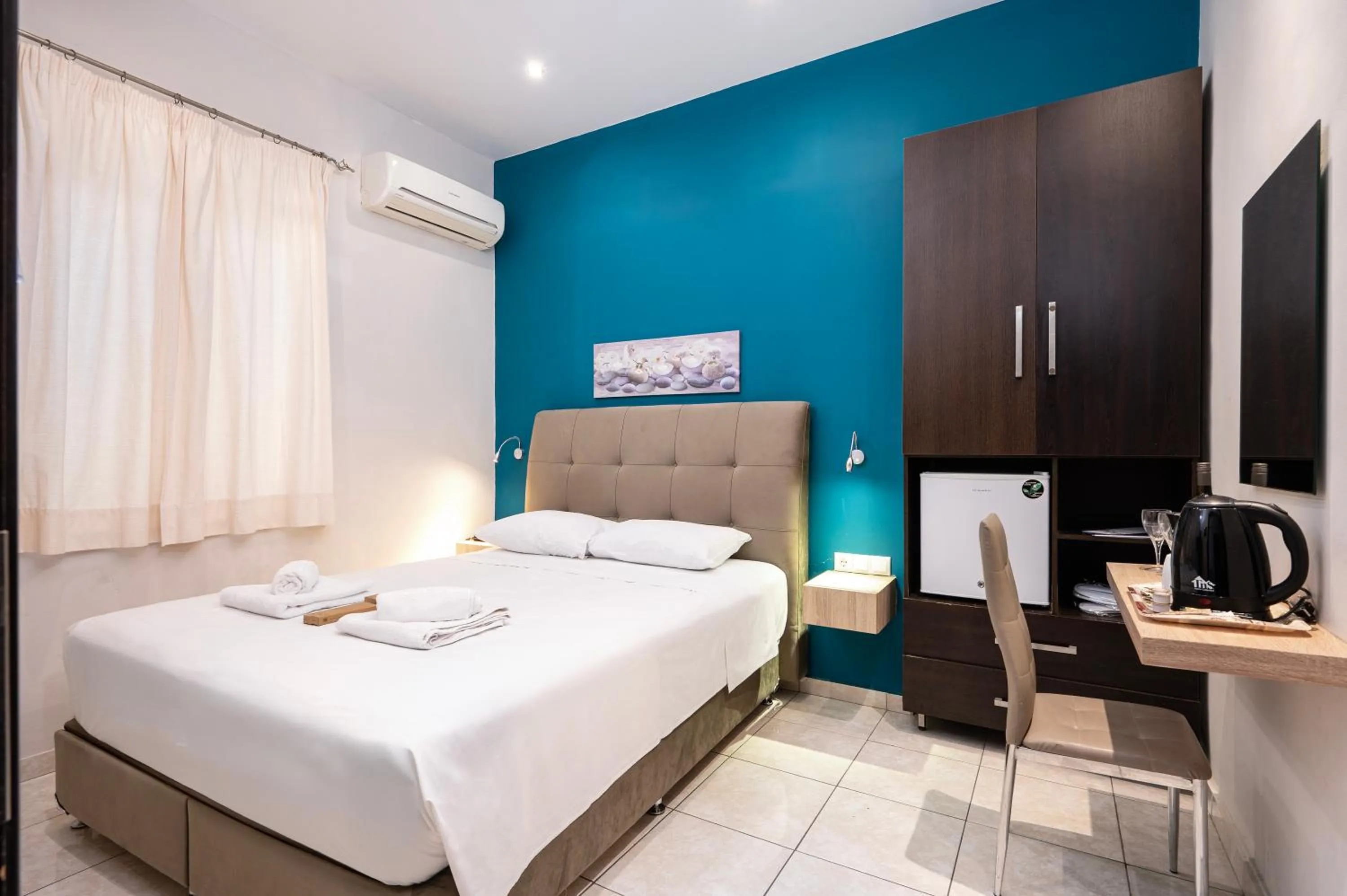 Bed in Sonia Hotel & Suites - Adults Only