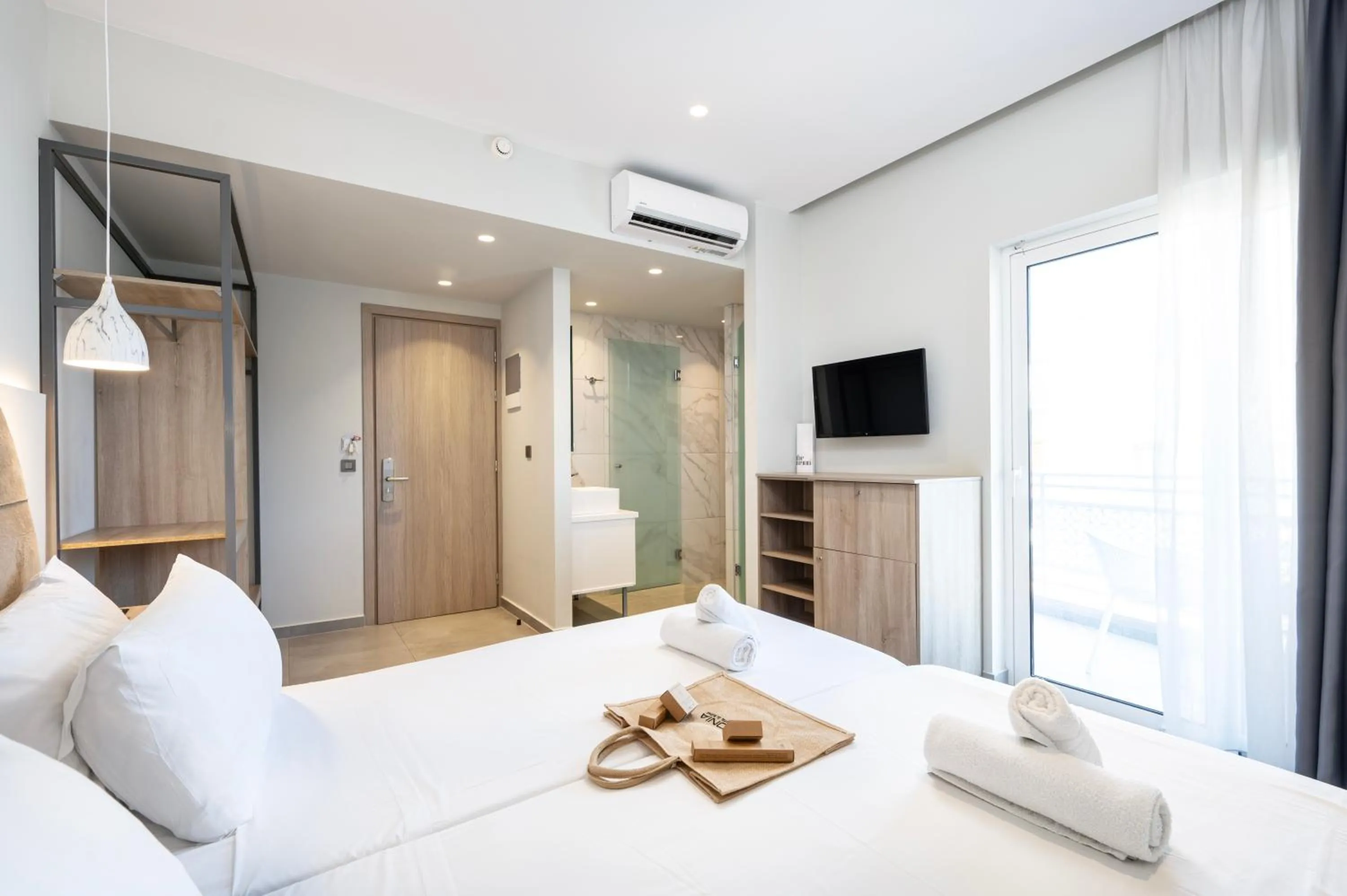 Bed in Sonia Hotel & Suites - Adults Only