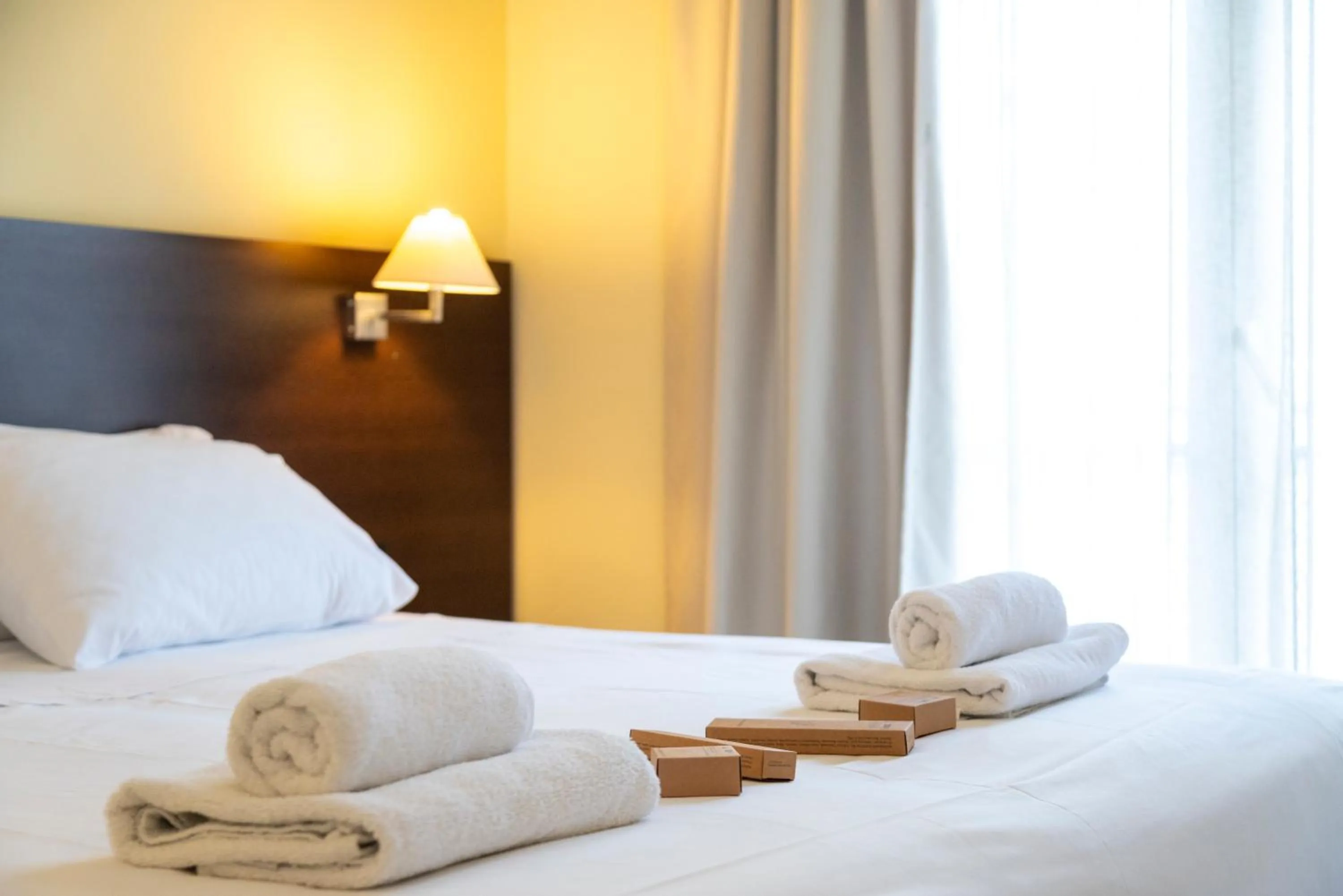 Bed in Sonia Hotel & Suites - Adults Only