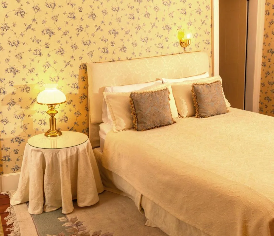 Bed in Historic Wilson-Guy House