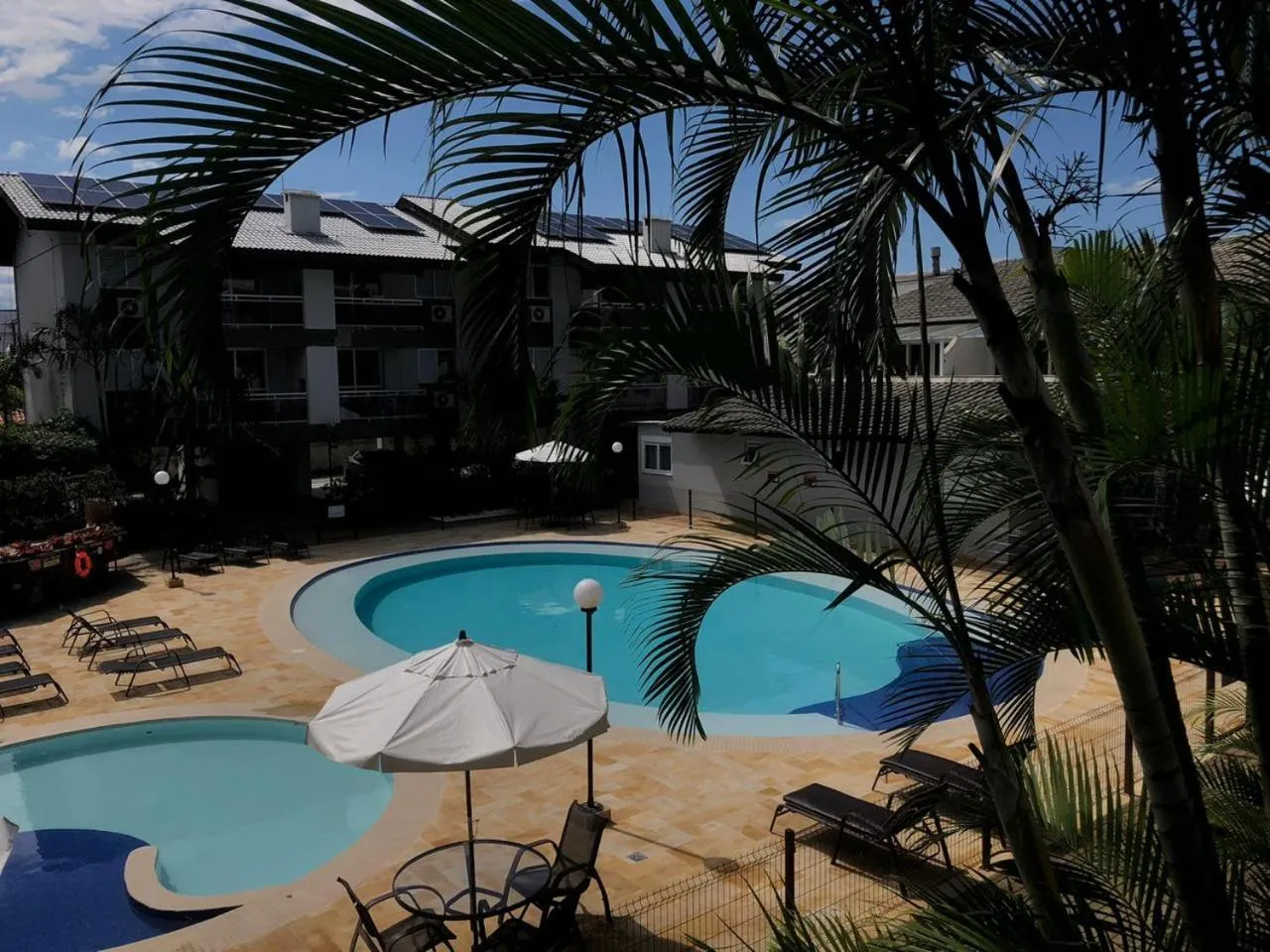 Swimming pool in Belluno Apart Hotel