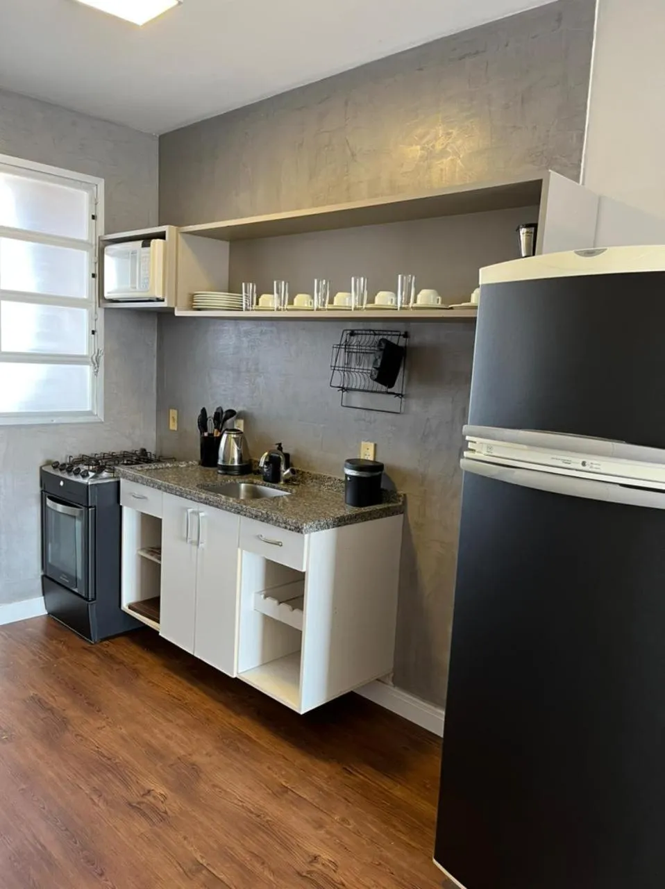 Kitchen or kitchenette in Belluno Apart Hotel