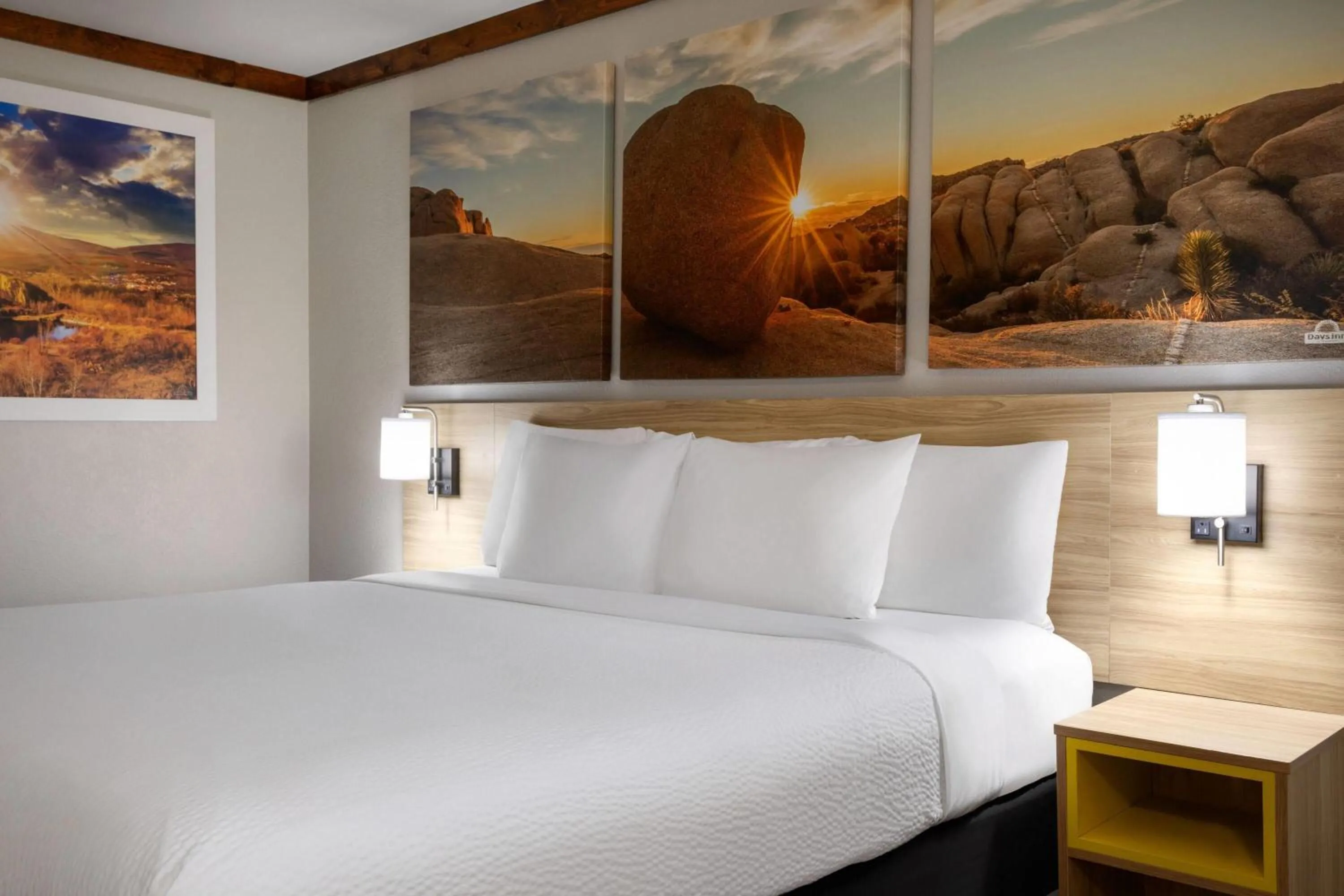 Bed in Days Inn by Wyndham Suites Fredericksburg