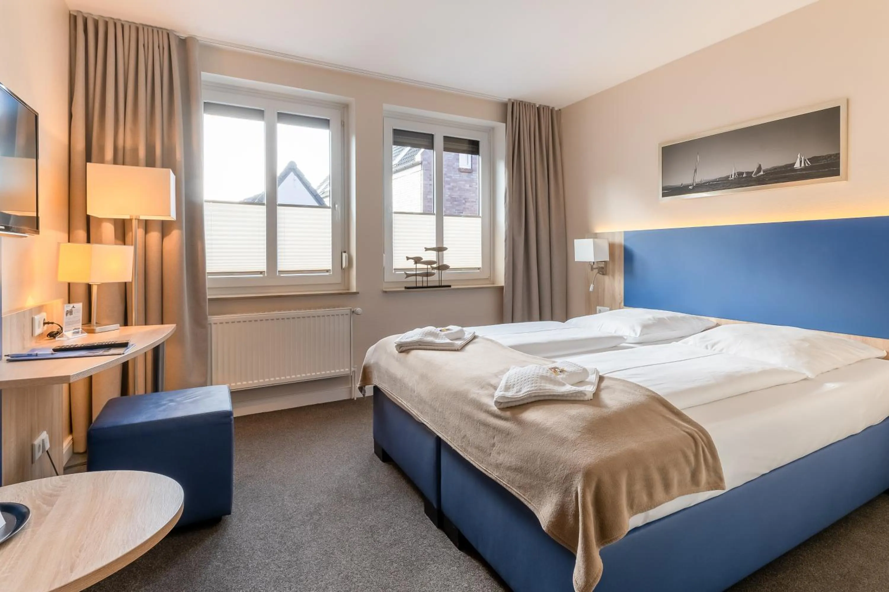 Photo of the whole room, Bed in Nordsee-Hotel Hinrichsen