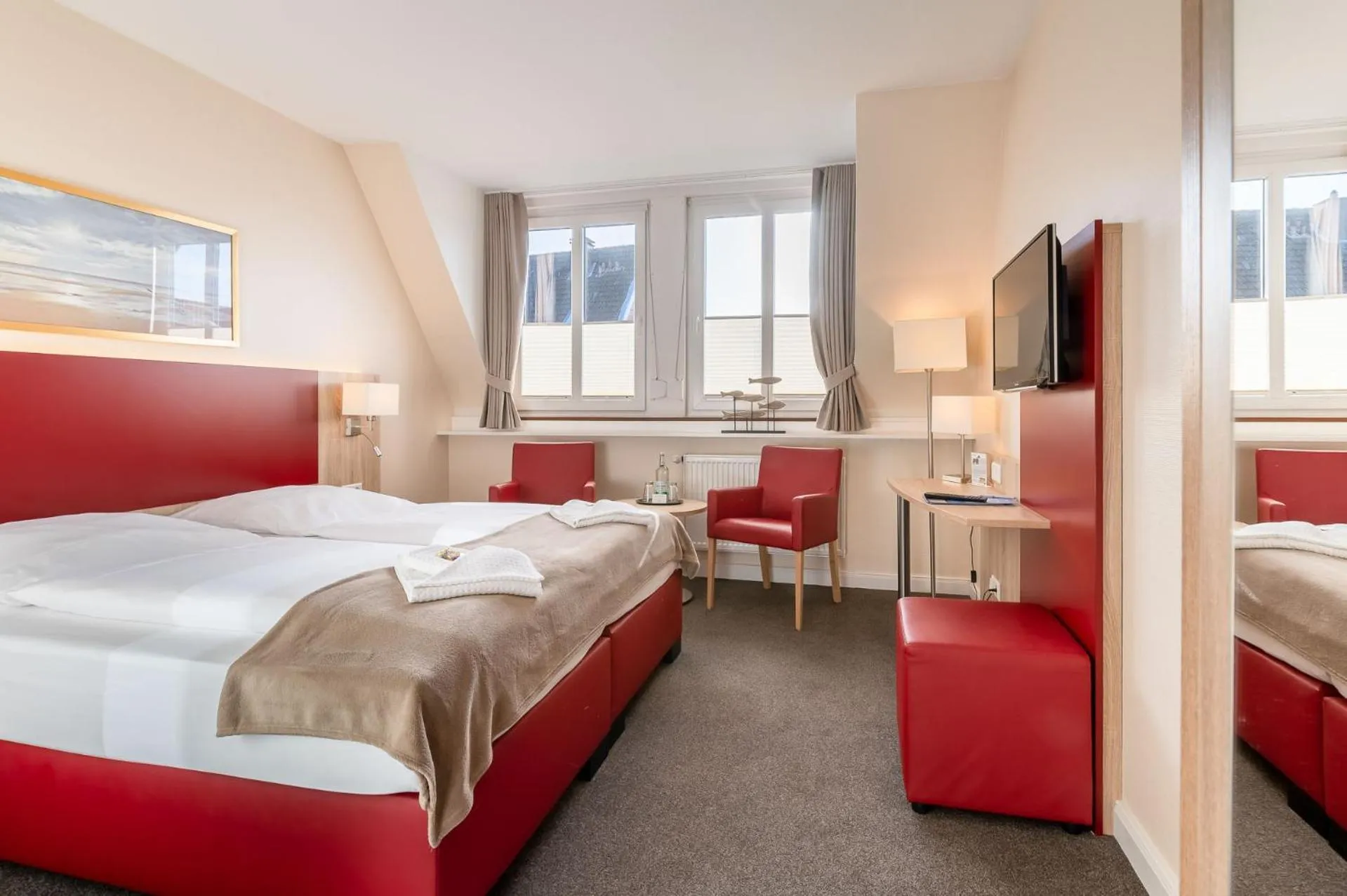 Photo of the whole room, Bed in Nordsee-Hotel Hinrichsen
