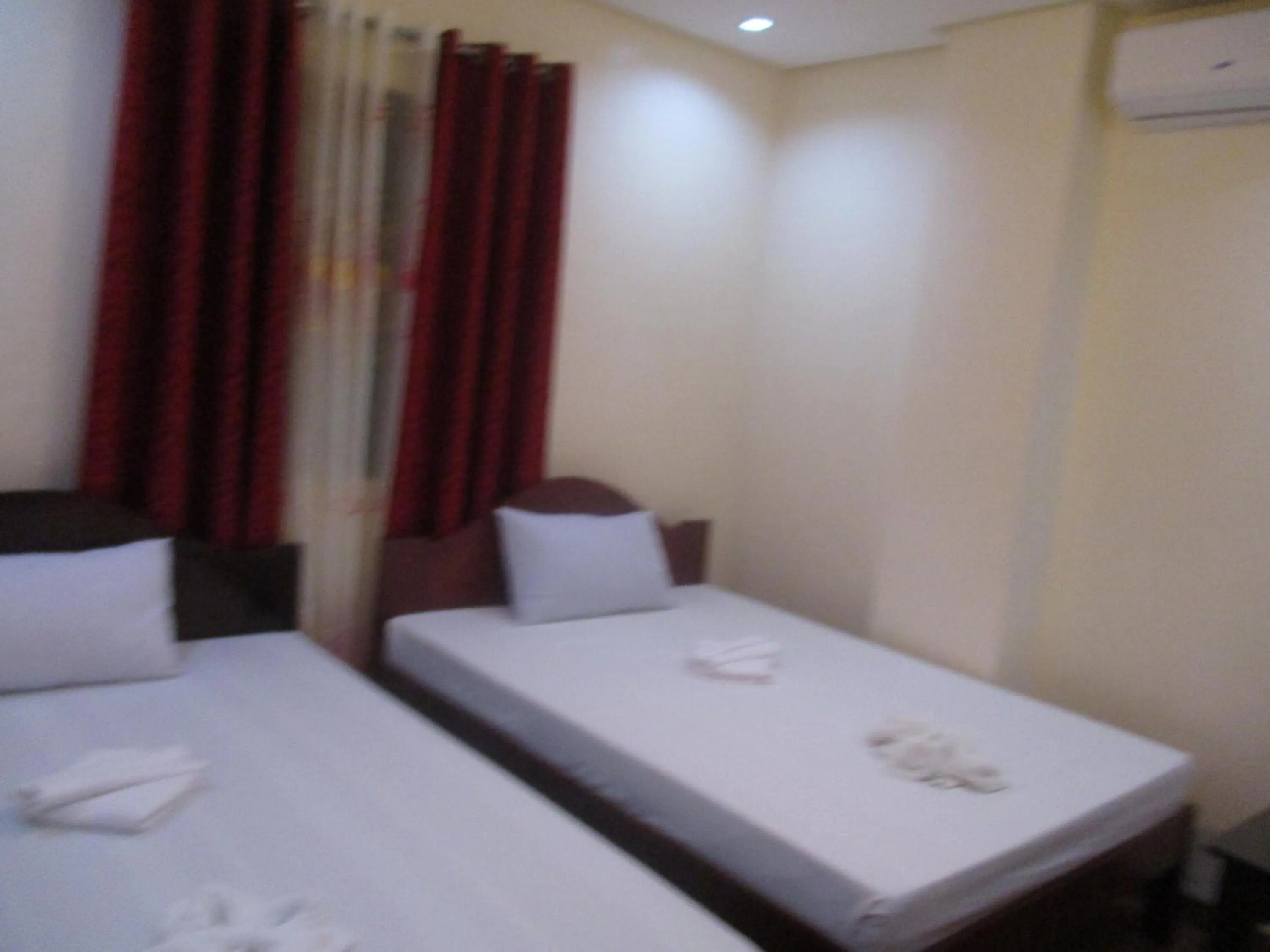 Bed in WMV Hotel & Restaurant