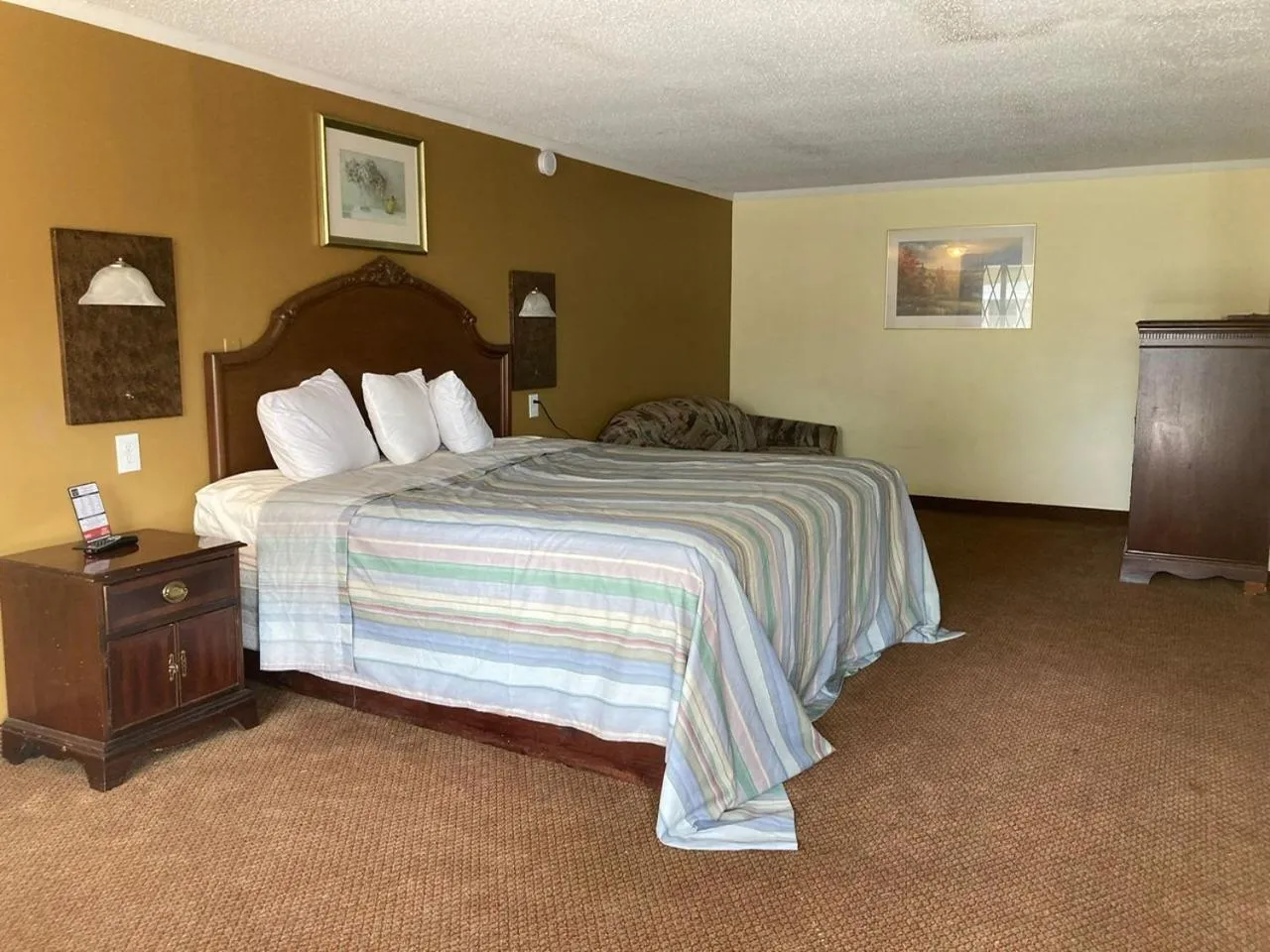 Bedroom in Rodeway Inn & Suites