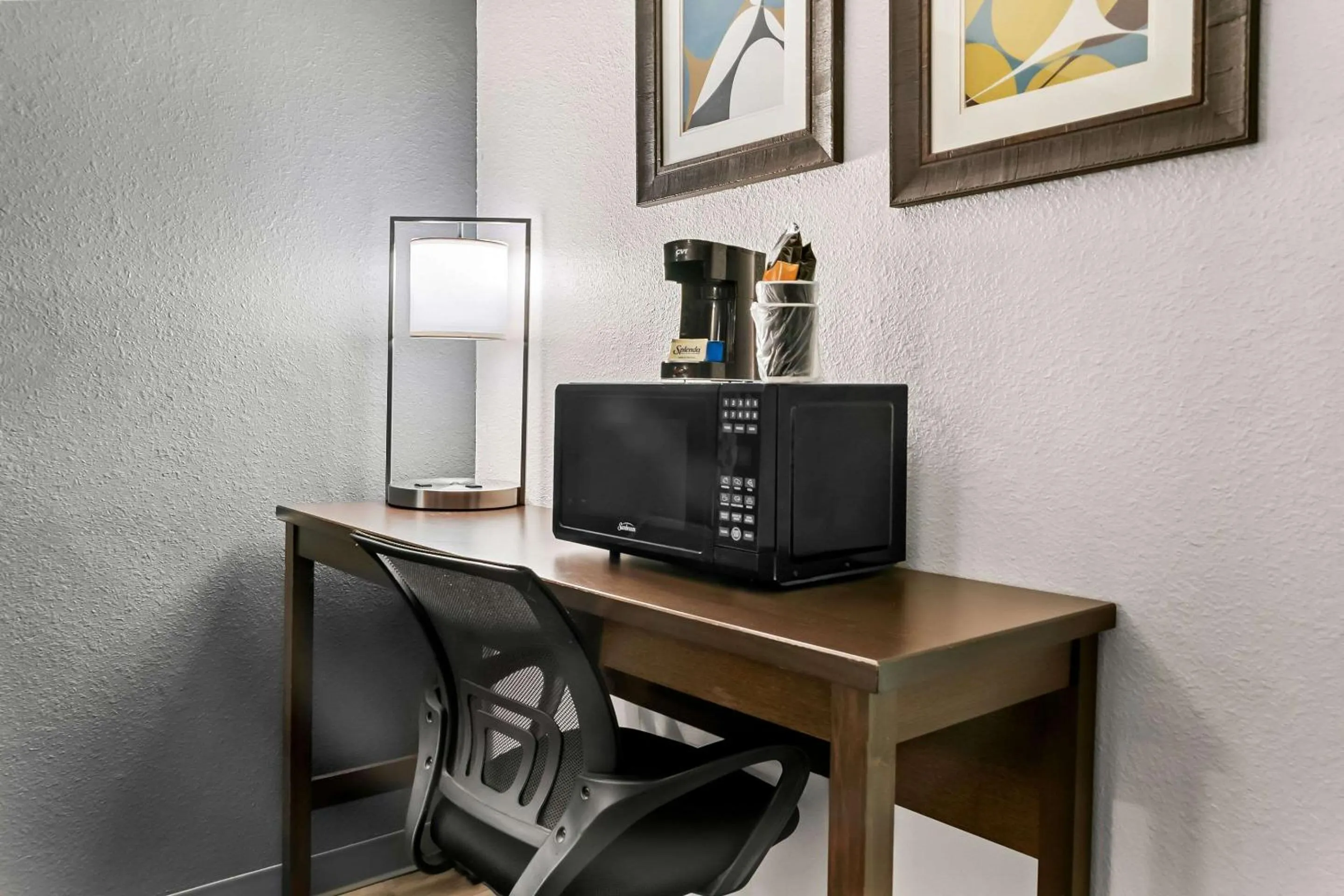 Bedroom in Rodeway Inn & Suites
