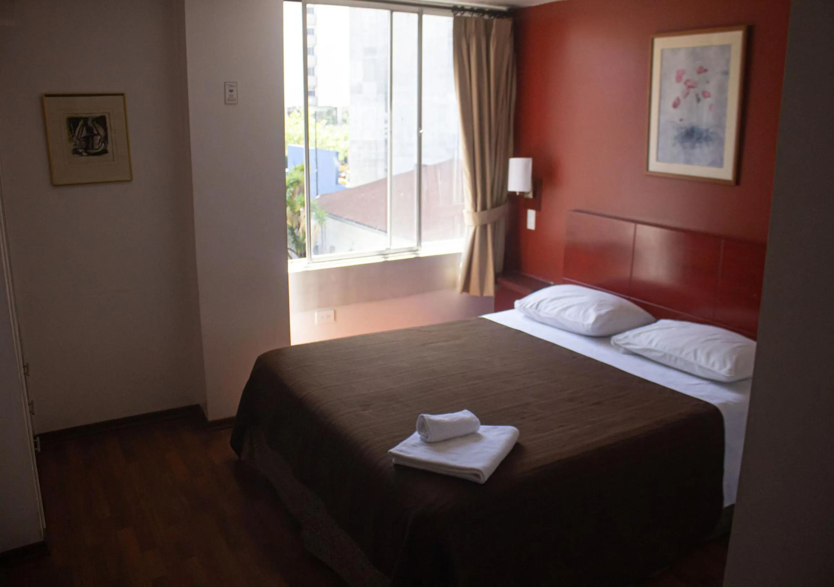 Bed in Filatelia Suites & Travel