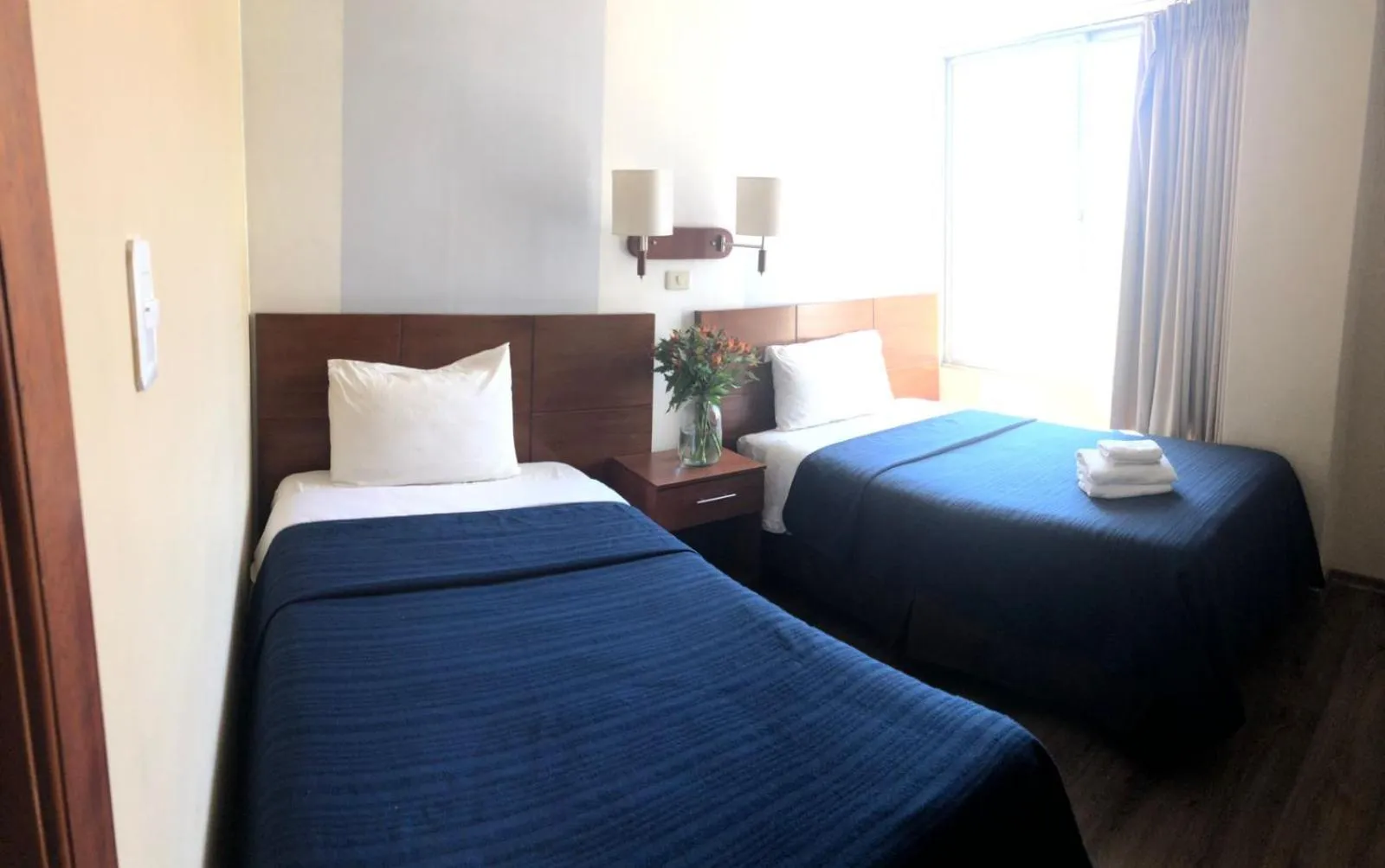 Bed in Filatelia Suites & Travel