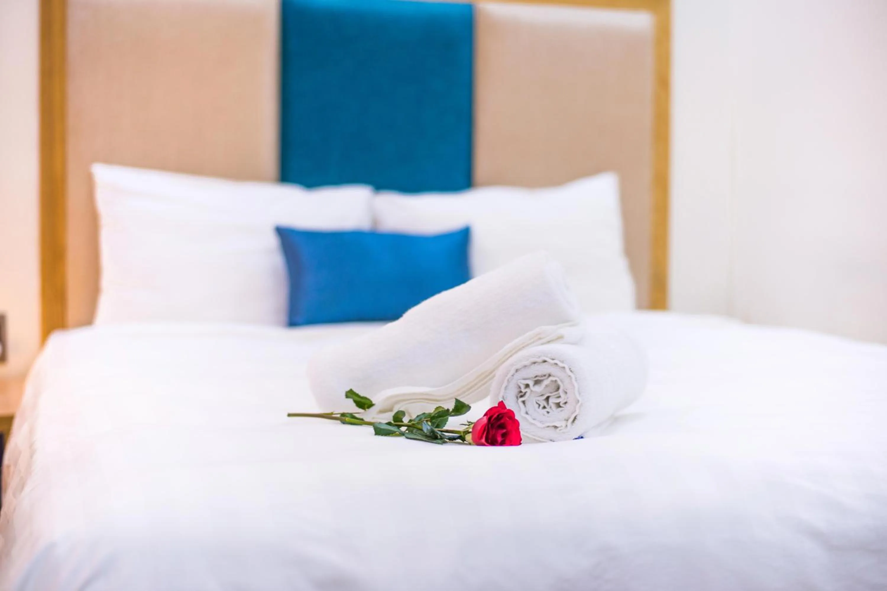 Bed in Sincero Hotel & Apartment