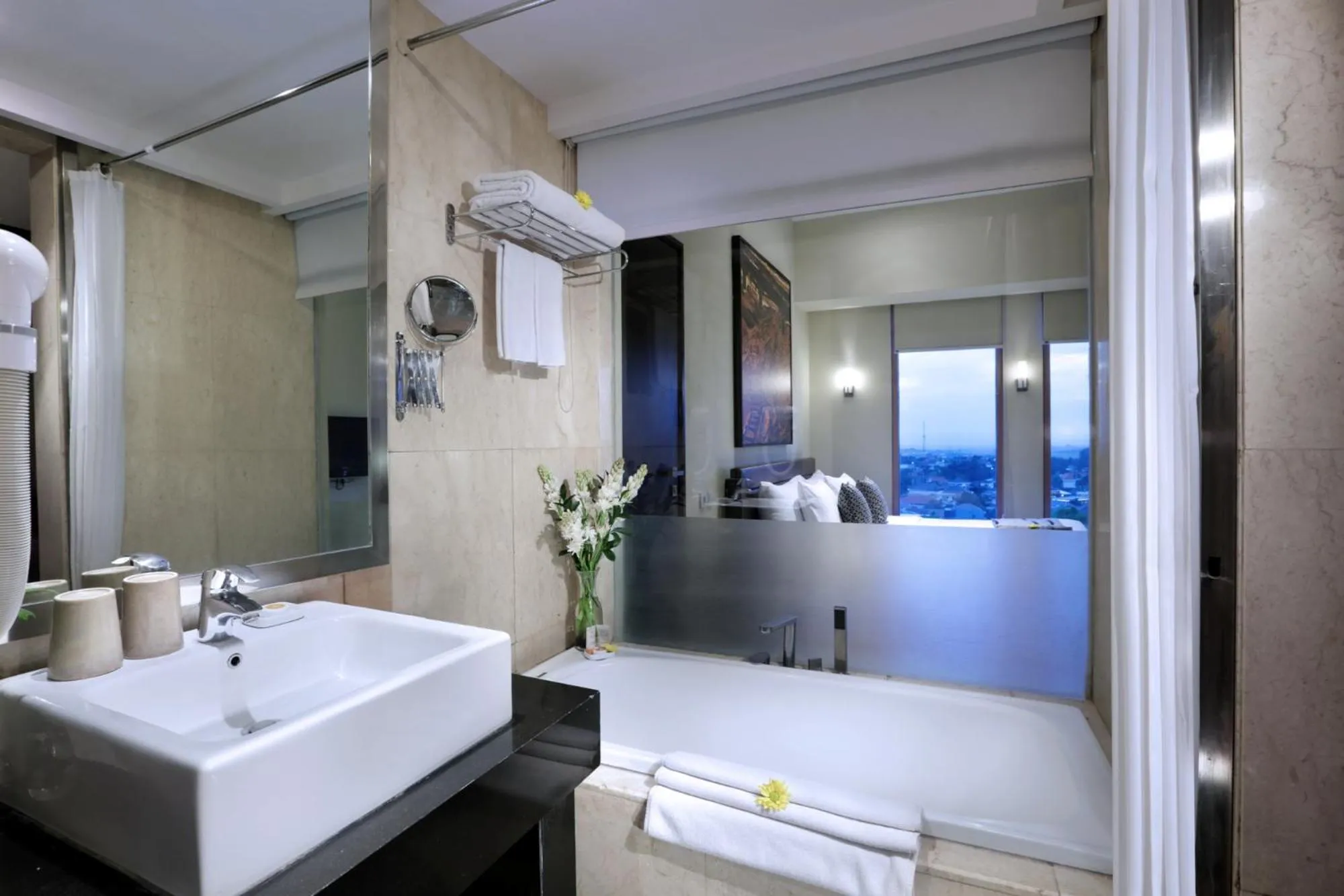 Bathroom, Bed in Grand Candi Hotel