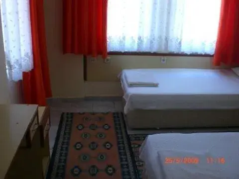 Bed in Red Rose Hotel Bed in Red Rose Hotel