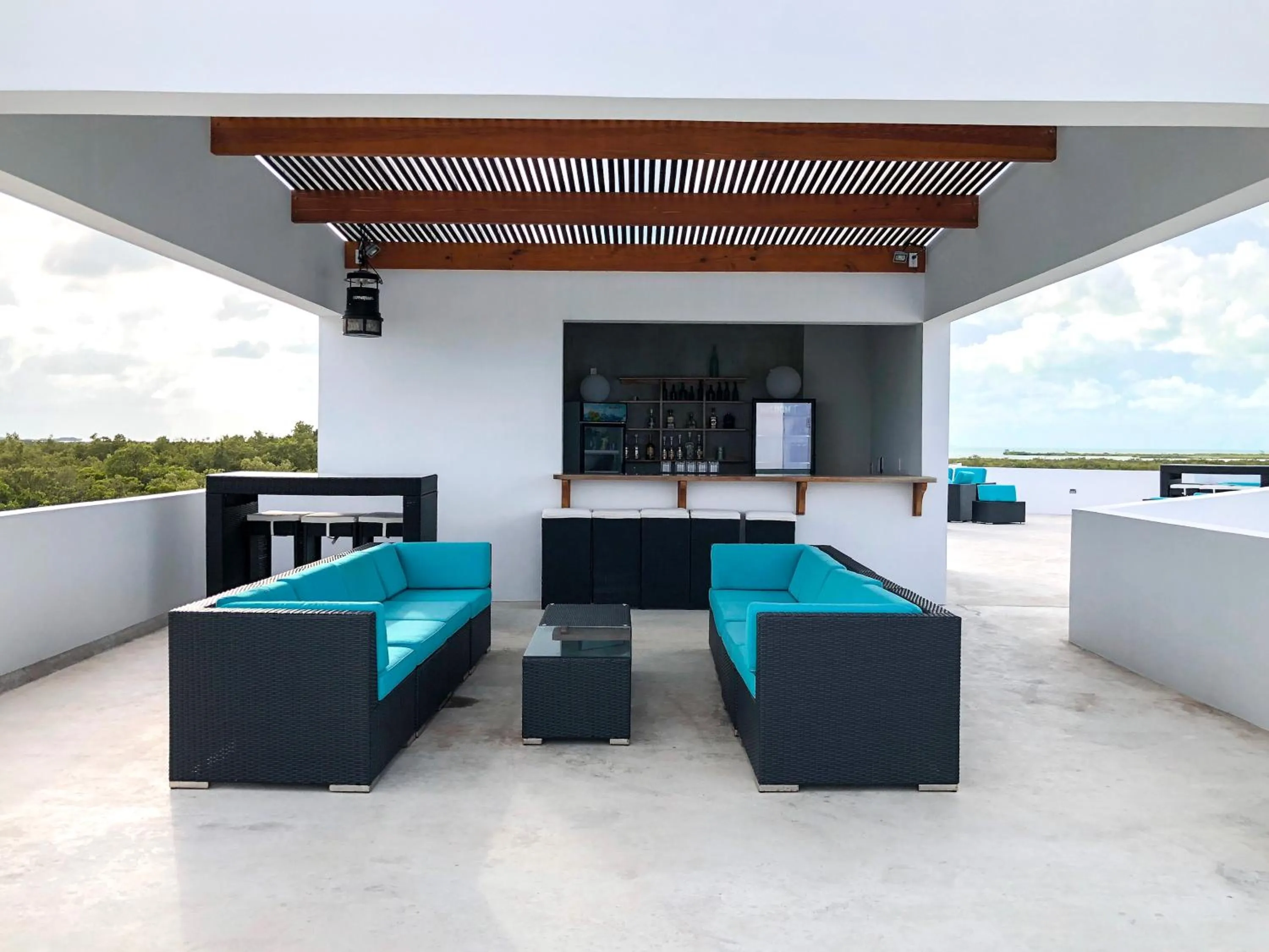 Communal lounge/ TV room in Playa De Sala Boutique Hotel