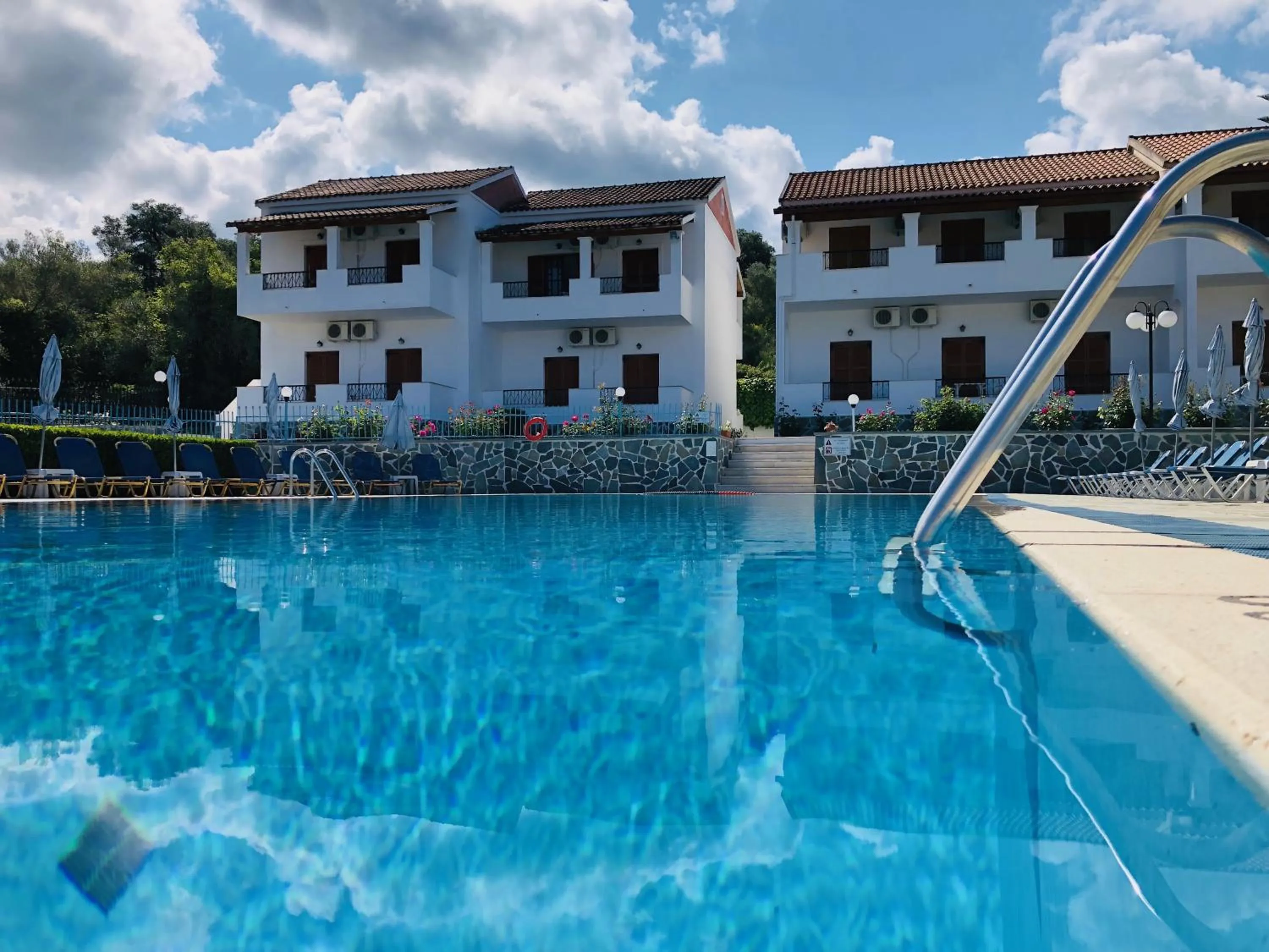 Property building in Tria Adelphia