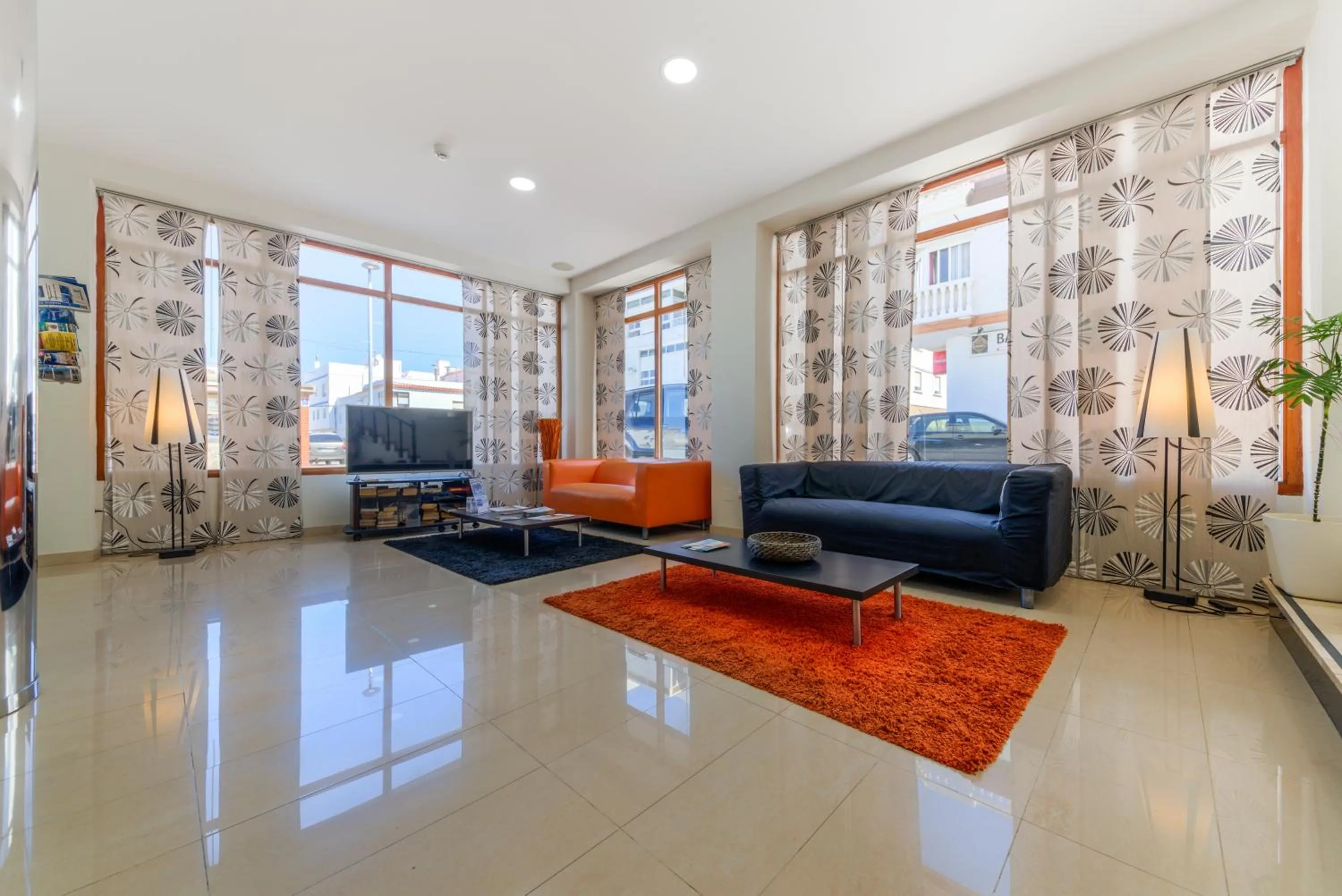 Communal lounge/ TV room in Hotel La Mirada