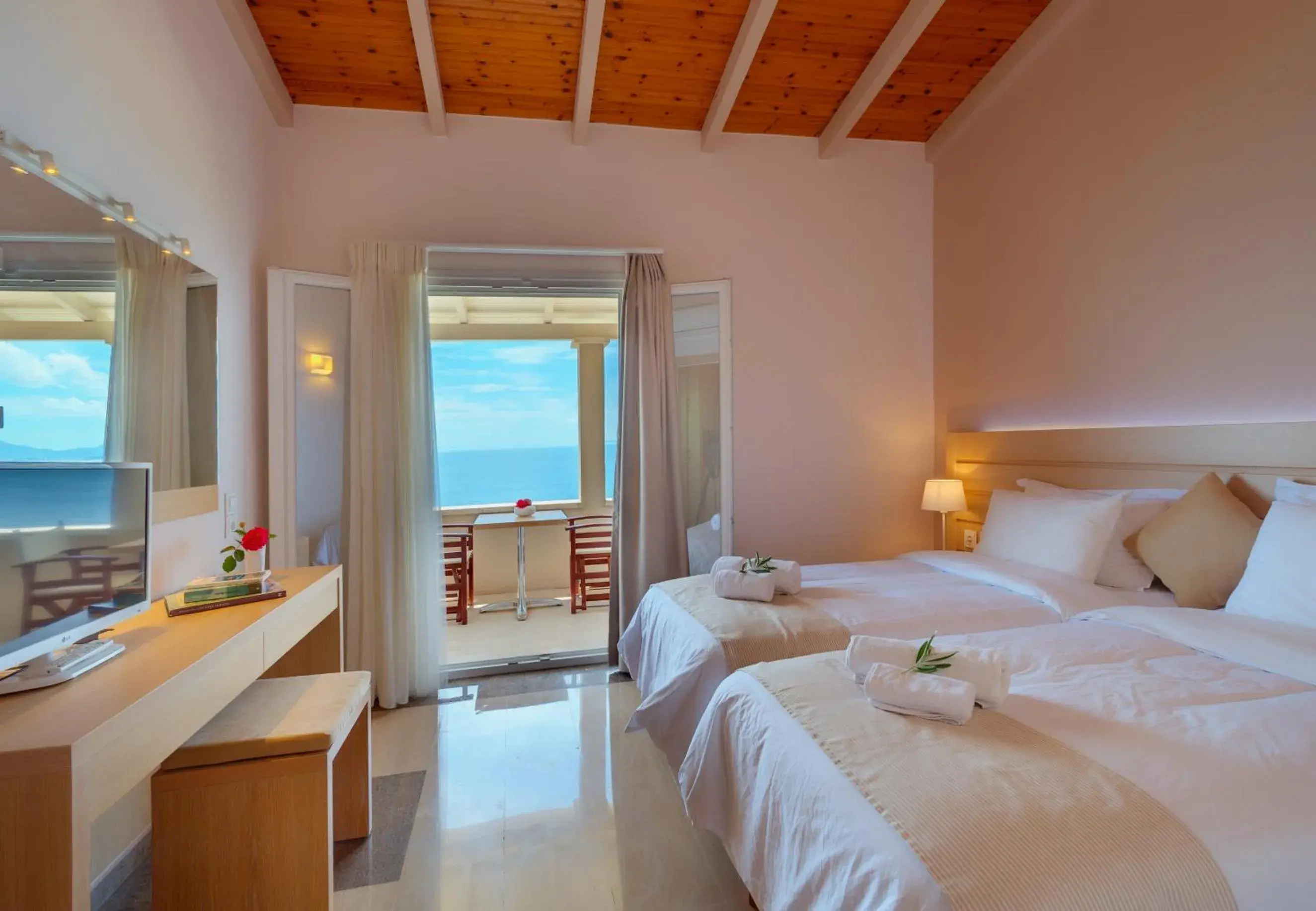 TV and multimedia, Bed in Krouzeri Beach Apartments TV and multimedia, Bed in Krouzeri Beach Apartments