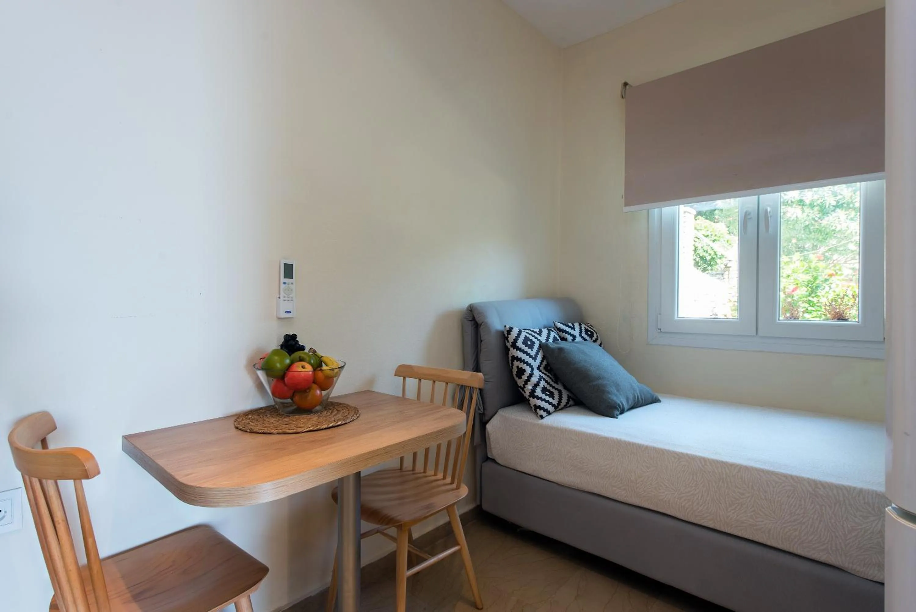 Bed in Krouzeri Beach Apartments