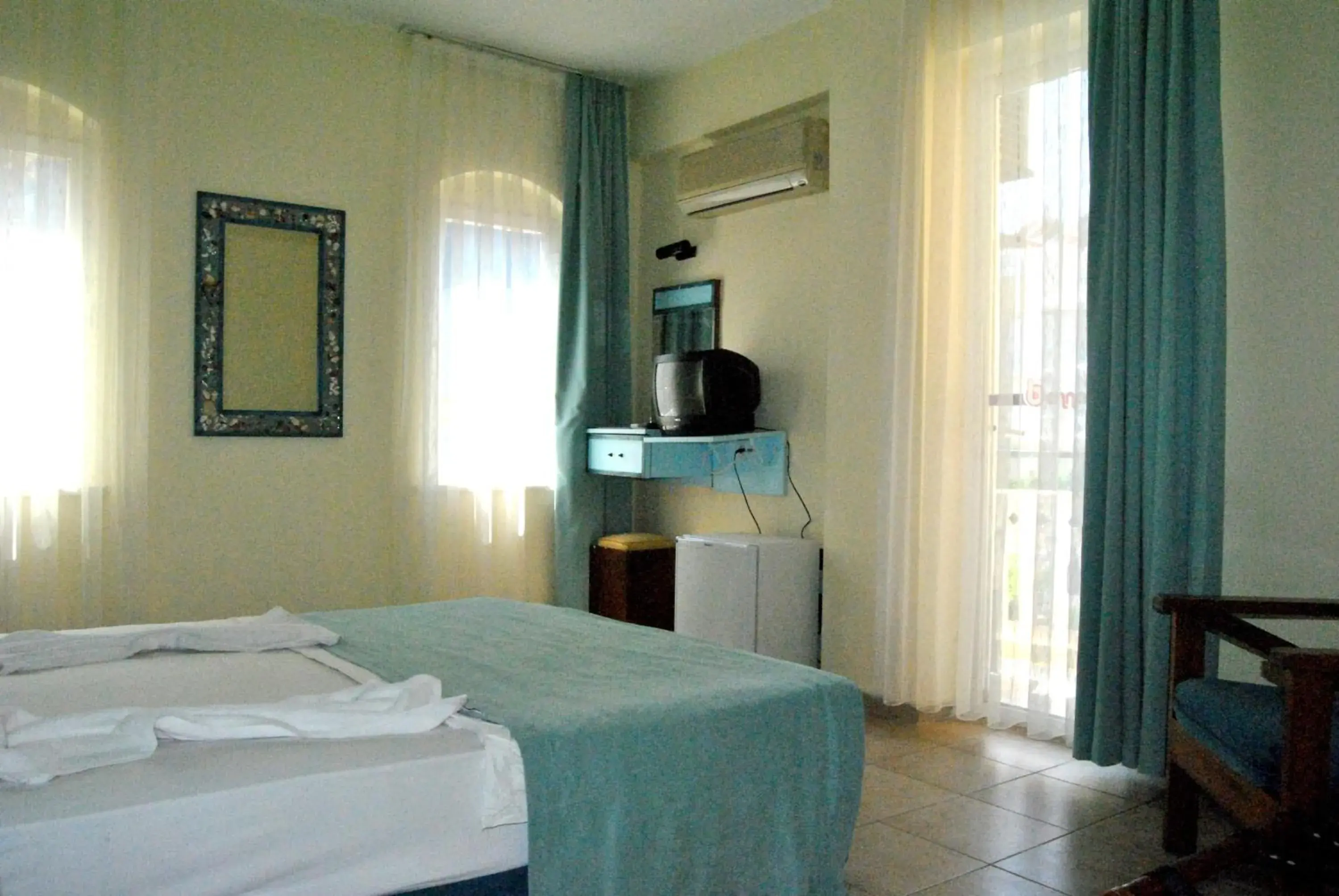 Decorative detail, Bed in Benna Hotel Decorative detail, Bed in Benna Hotel