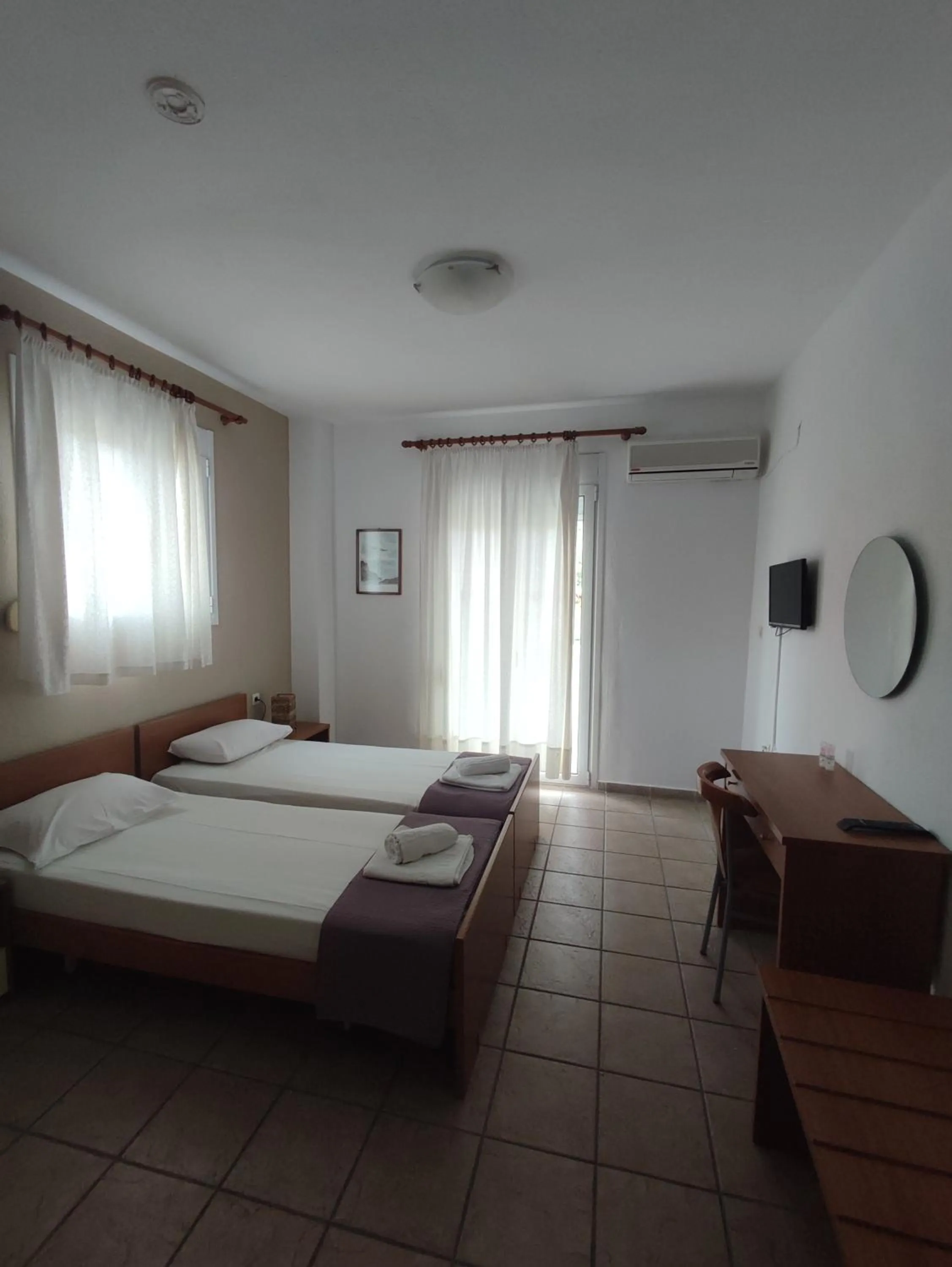 Photo of the whole room, Bed in Bella Grecia