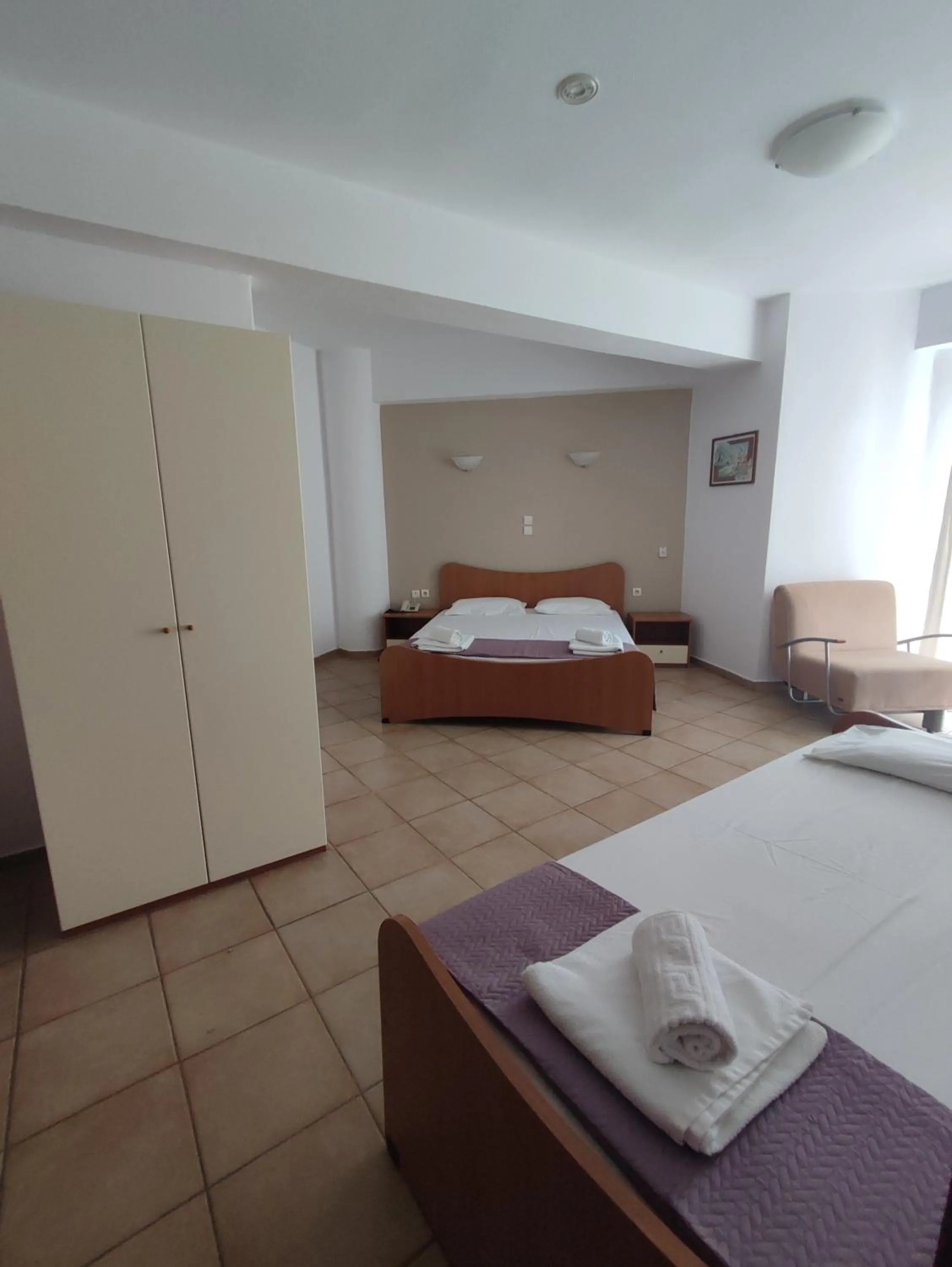 Photo of the whole room, Bed in Bella Grecia