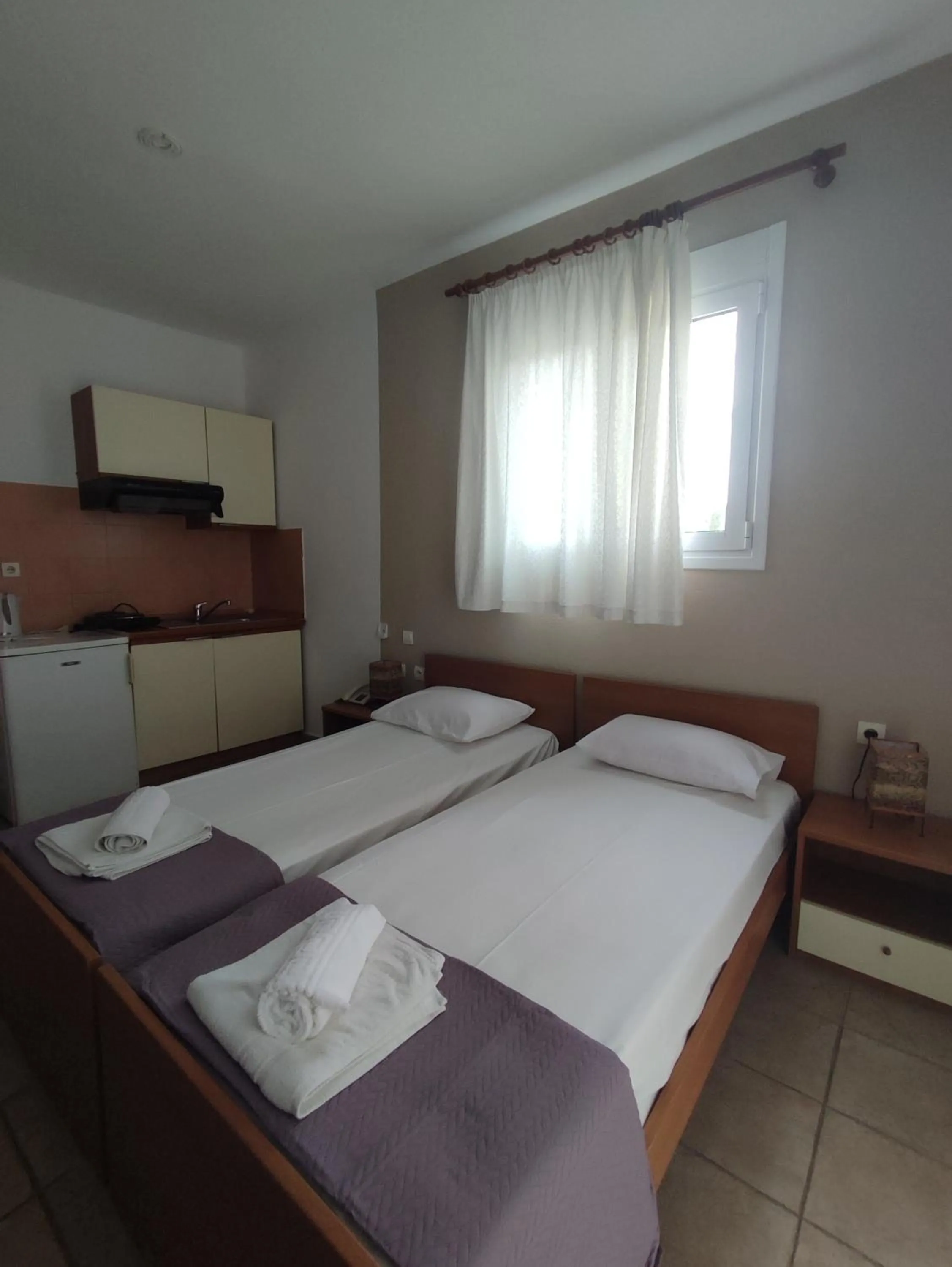 Photo of the whole room, Bed in Bella Grecia