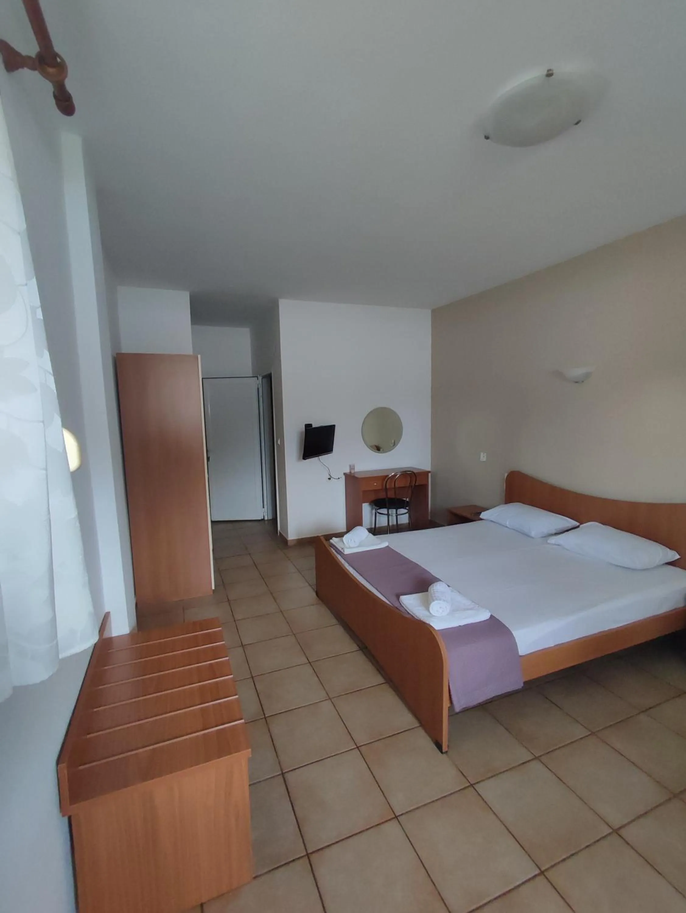 Photo of the whole room, Bed in Bella Grecia